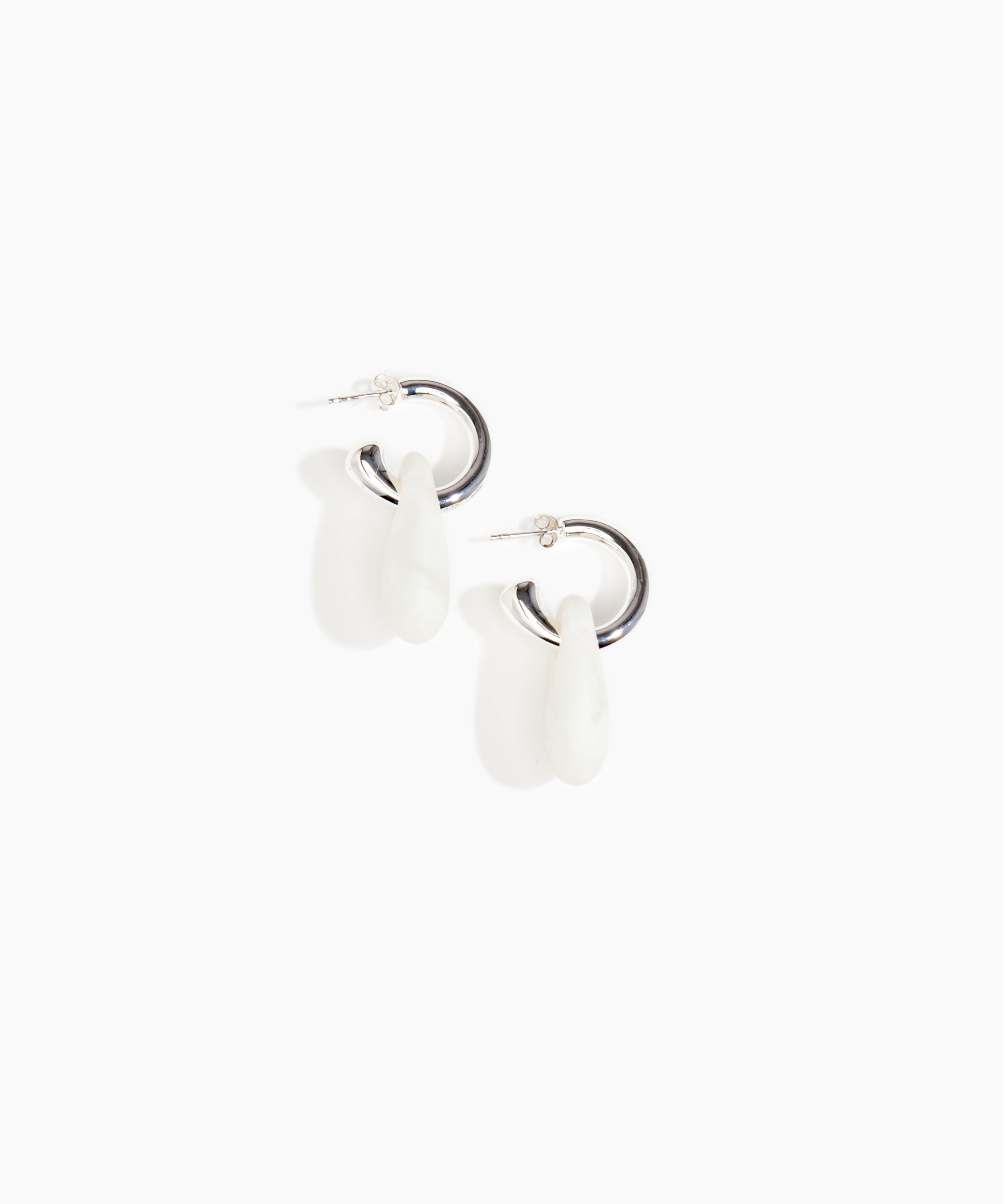 Dinosaur Designs Small Rock Hoop Earrings in Snow Swirl color resin with Silver-Plated Brass Hoop Material