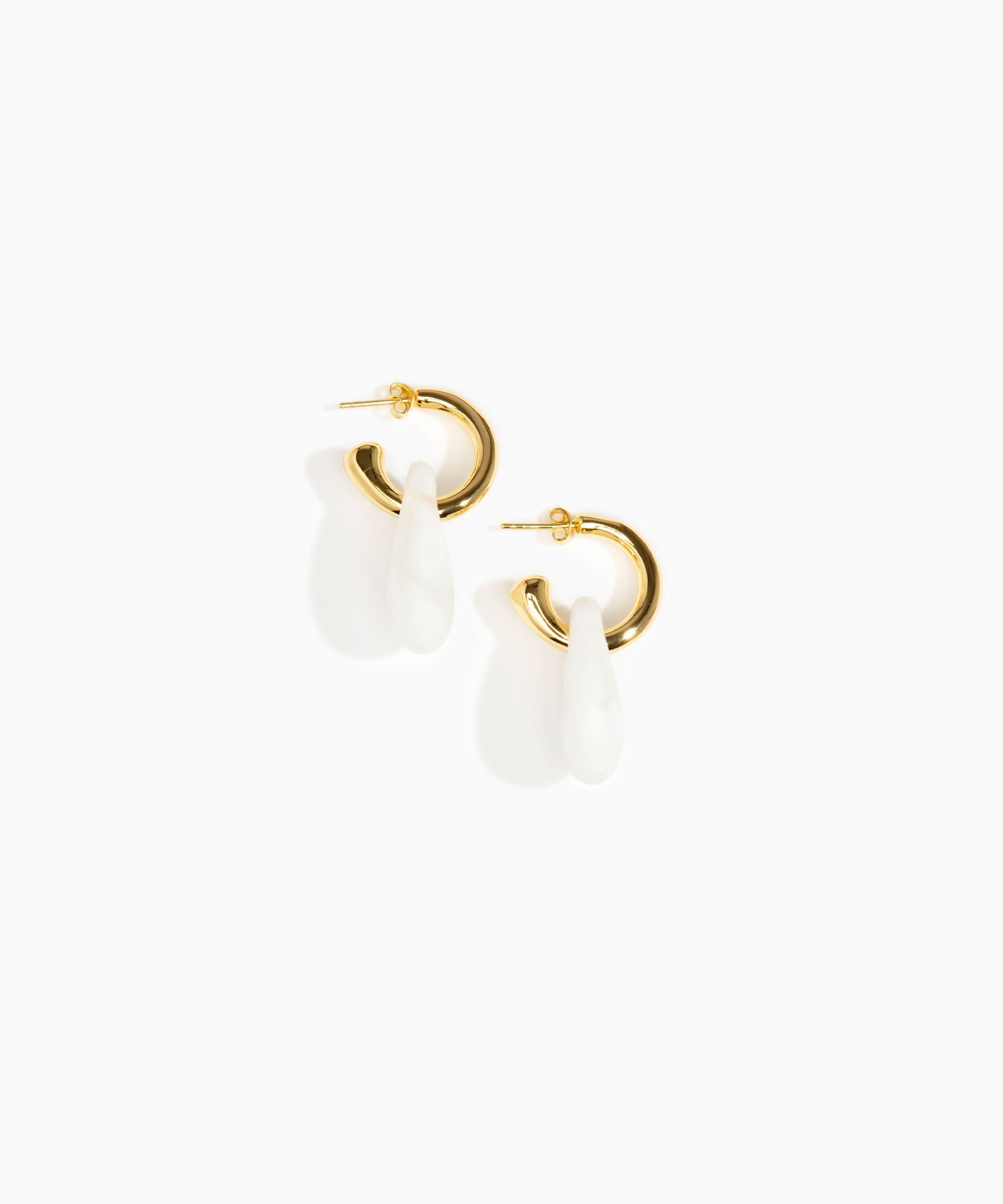 Dinosaur Designs Small Rock Hoop Earrings in Snow Swirl color resin with Brass Hoop Material