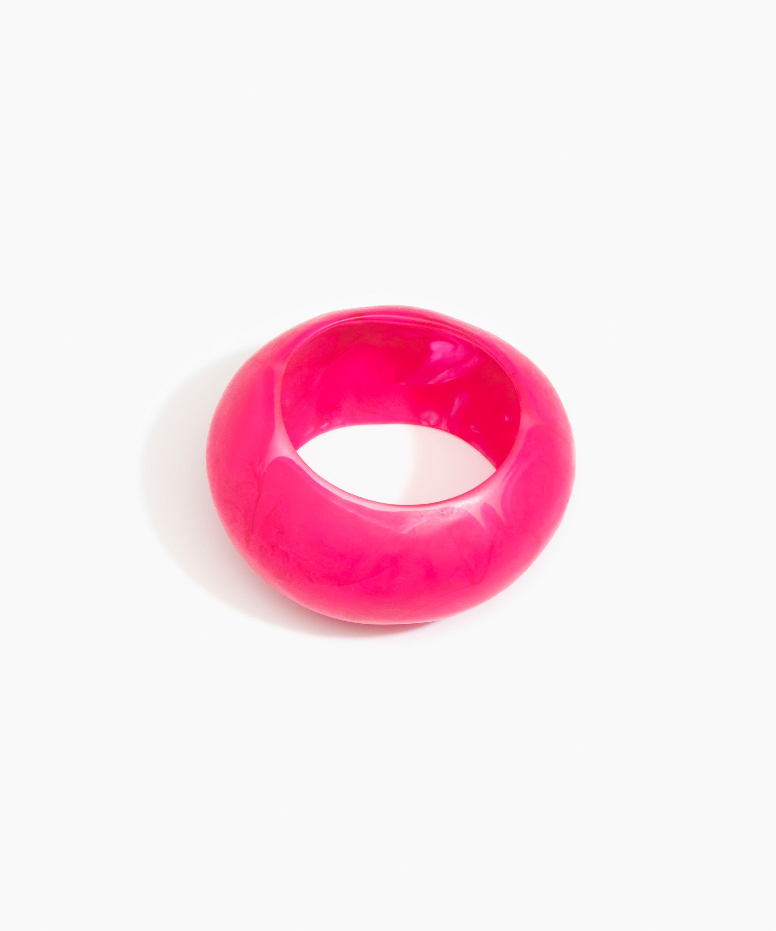 Dinosaur Designs Boulder Bangle in Flamingo color resin with Wide Fit