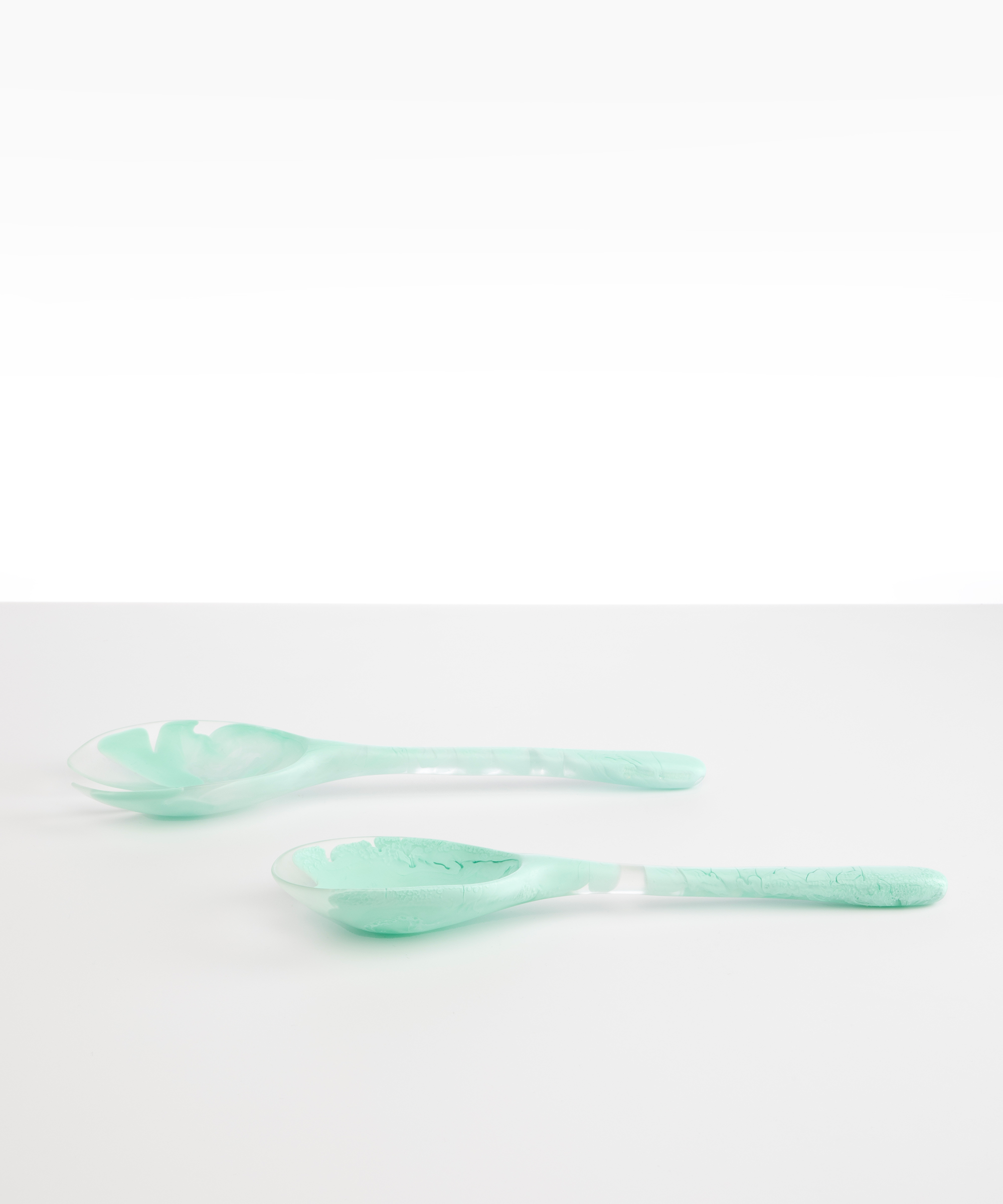 Dinosaur Designs Long Stone Servers in Mint color resin