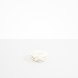Dinosaur Designs Boulder Coaster Coasters in Snow Swirl color resin