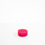 Dinosaur Designs Boulder Coaster Coasters in Flamingo color resin