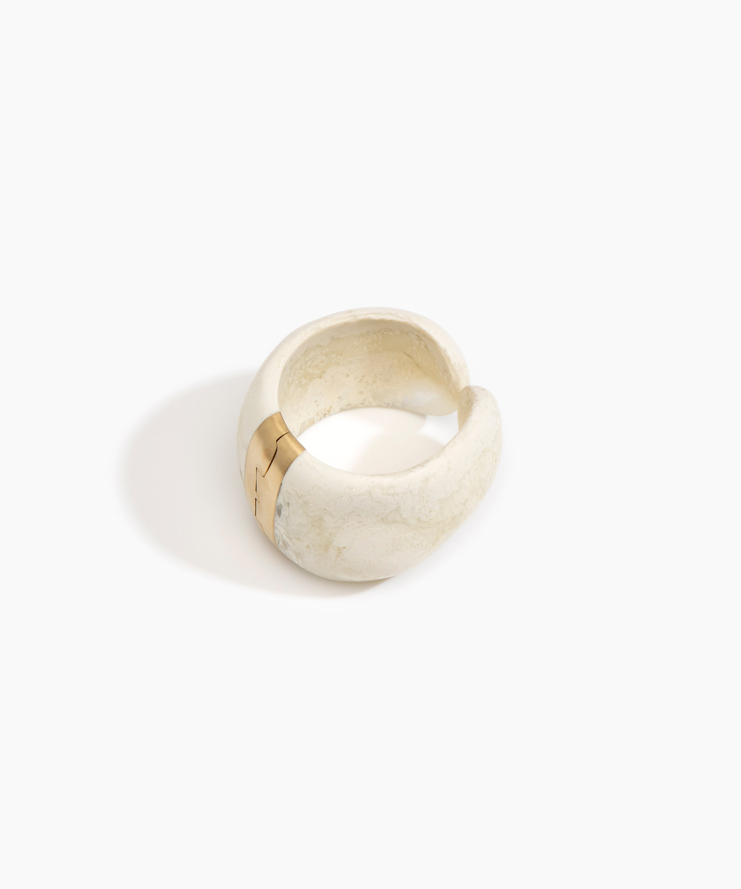 Dinosaur Designs Bold Stone Cuff in Chalk Swirl color resin with Brass Material