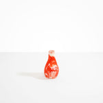 Dinosaur Designs Medium Liquid Vase in Strawberry color resin