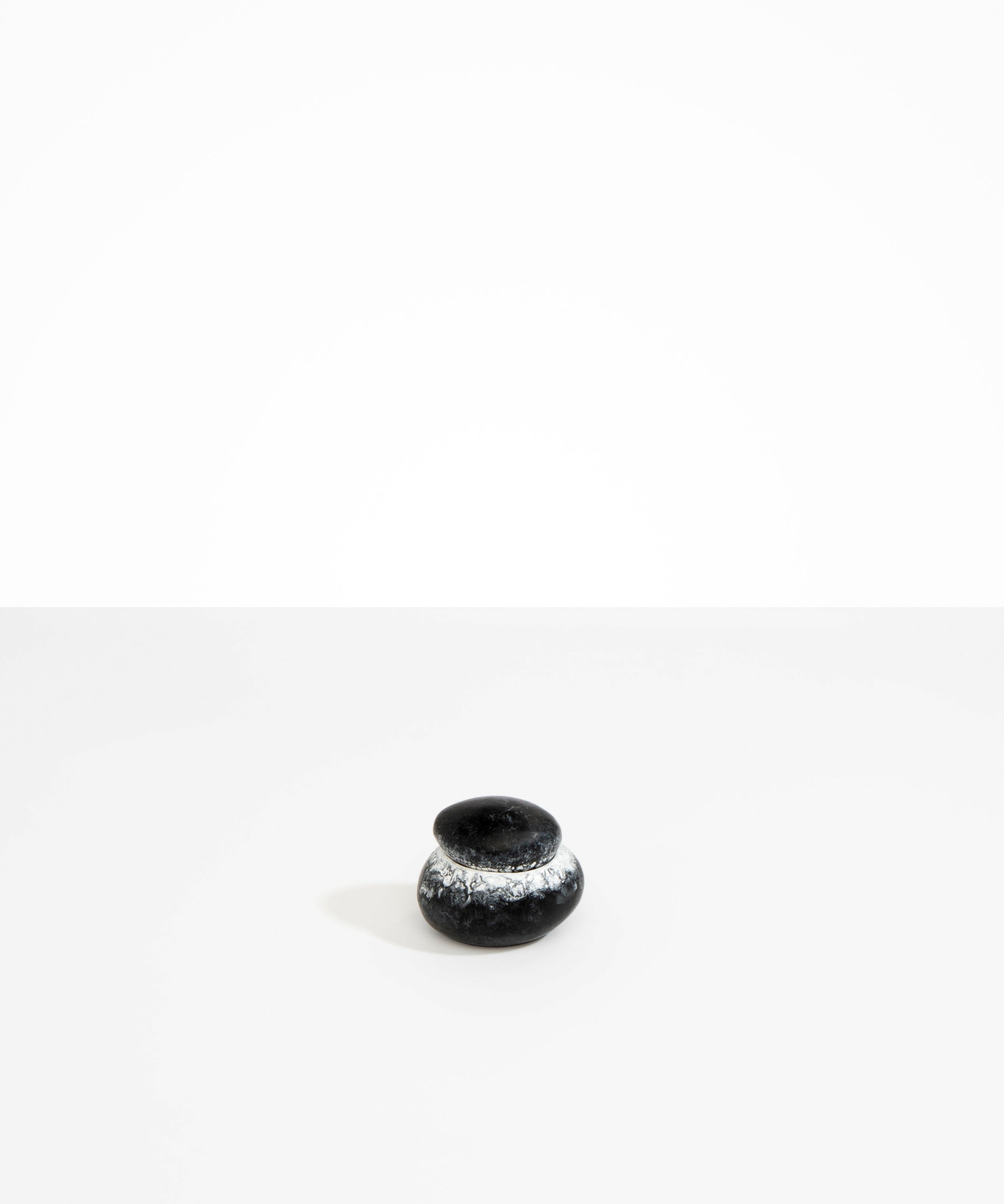 Dinosaur Designs Small Pebble Jar in Black Marble color resin