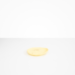 Dinosaur Designs Pebble Side Plate in Lemon color resin