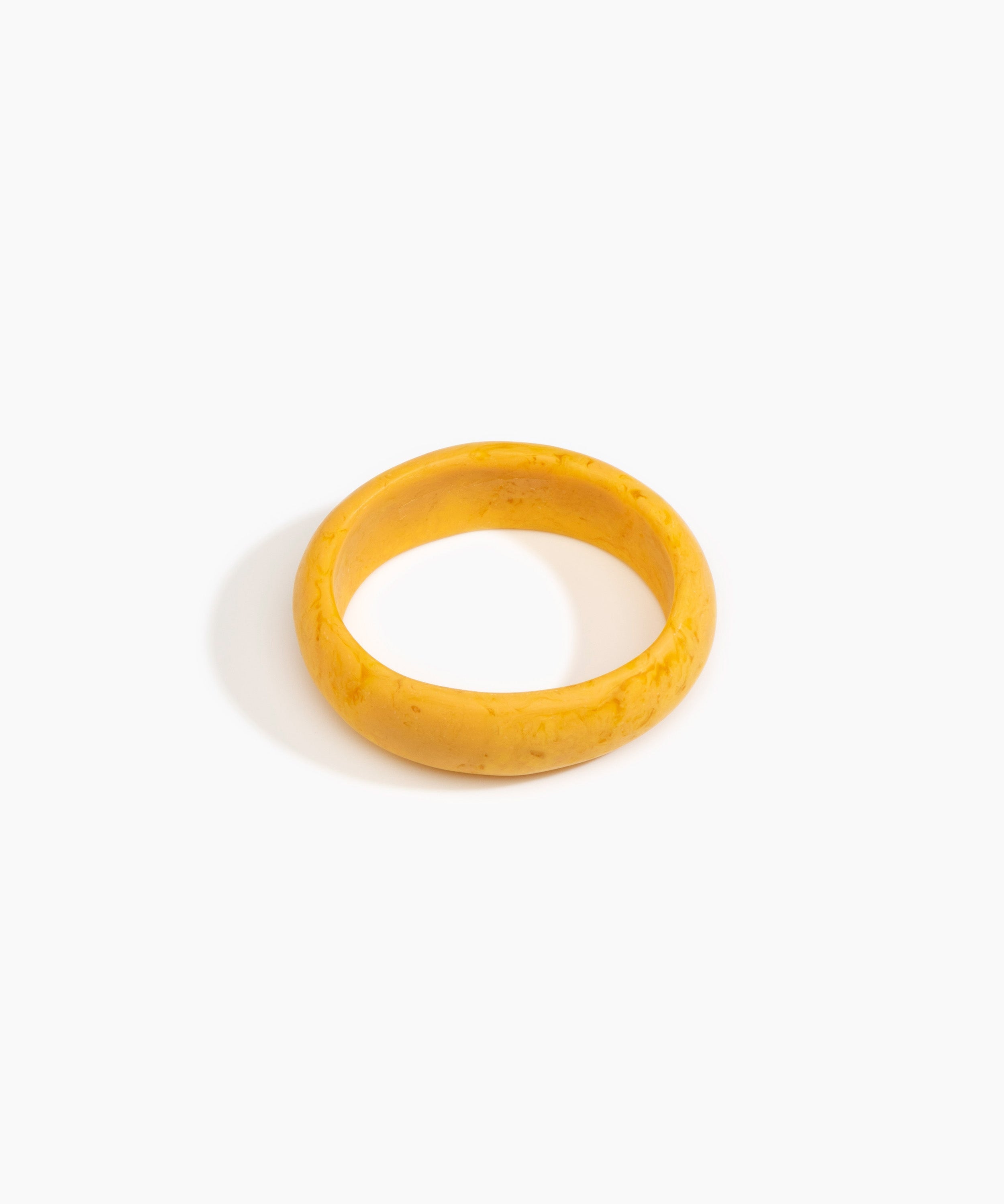 Dinosaur Designs Medium Organic Oval Bangle in Honeycomb color resin with Wide Fit