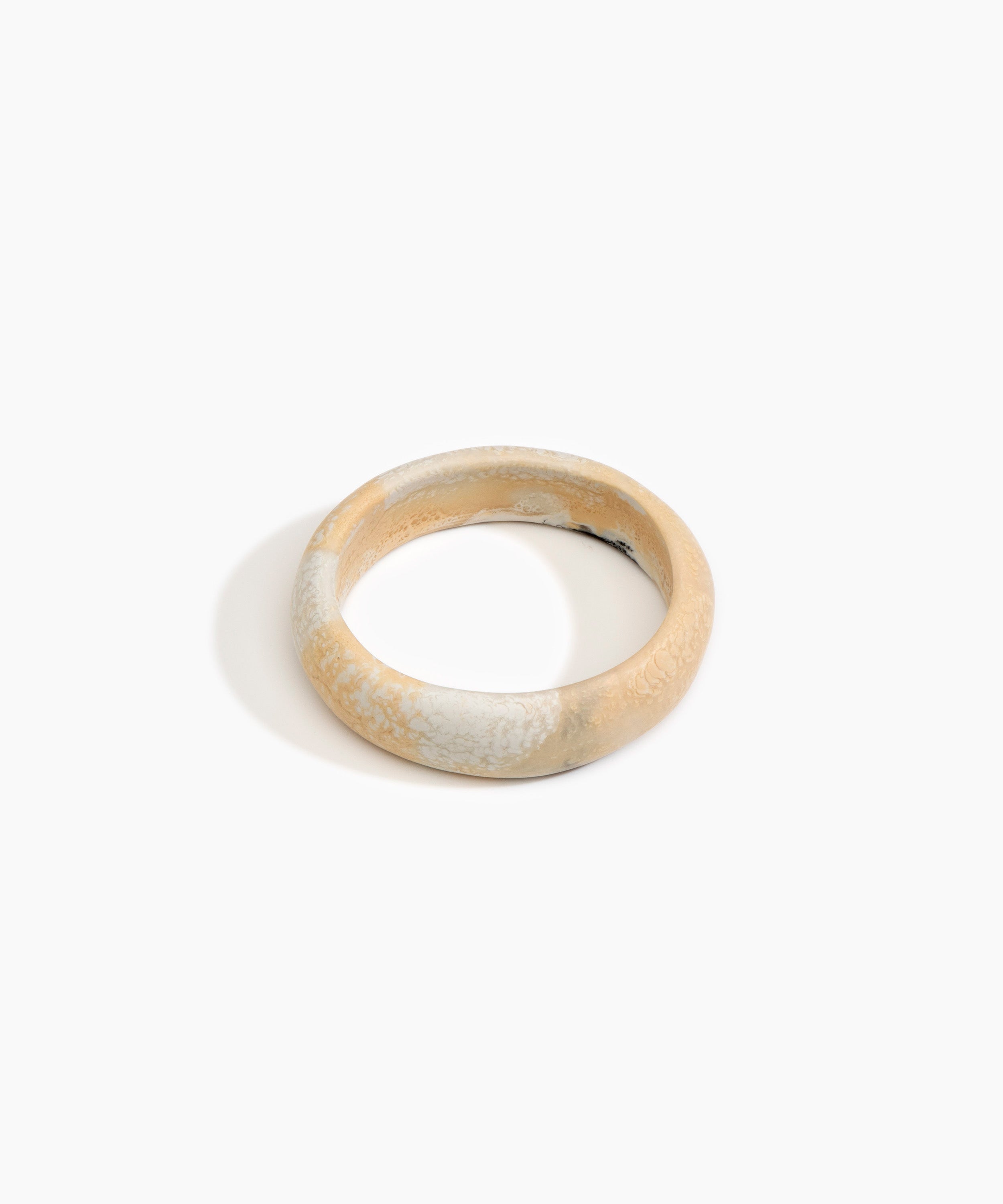 Dinosaur Designs Medium Organic Oval Bangle in Sandy Pearl color resin with Wide Fit