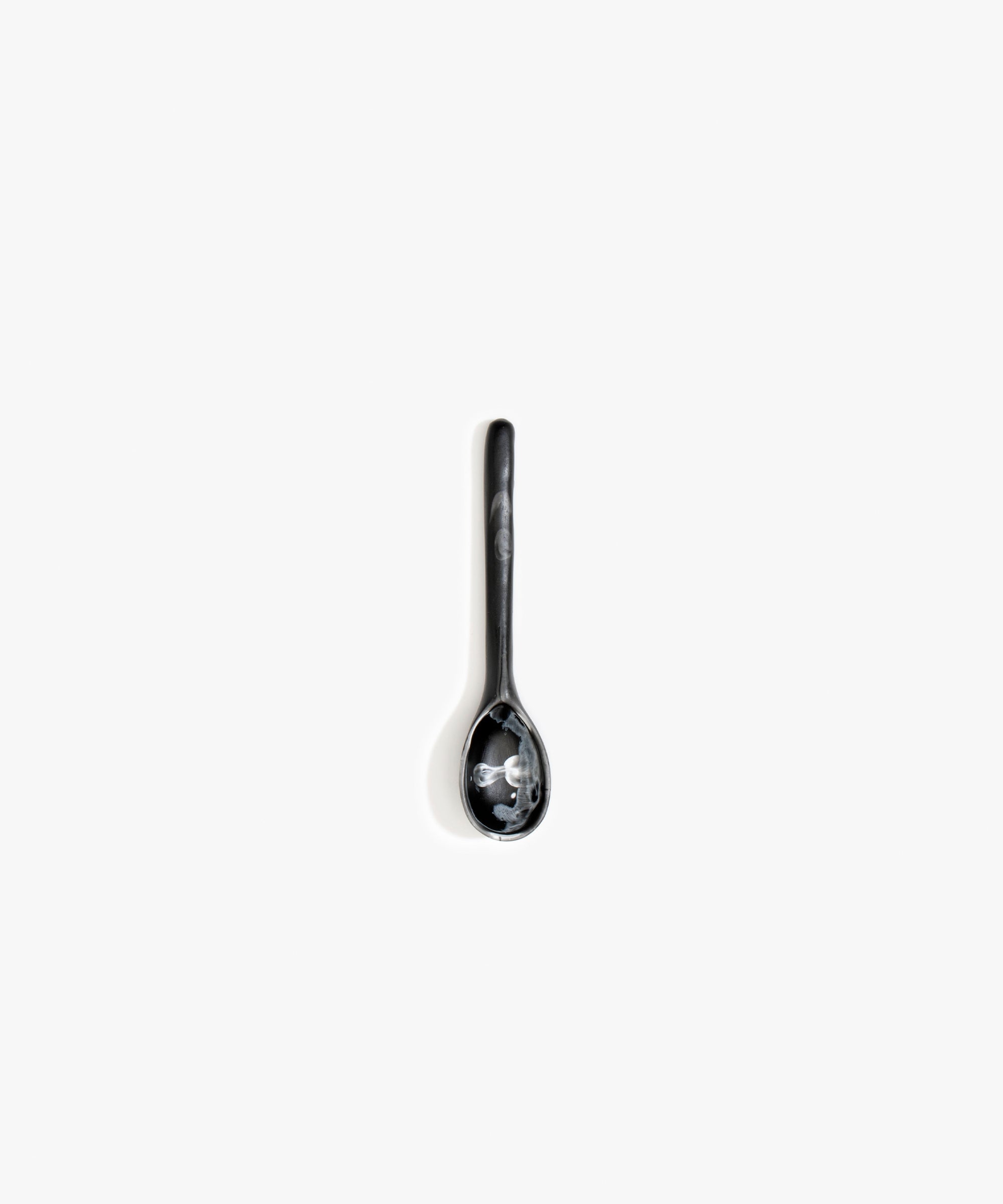Dinosaur Designs Stone Spoon in Black Marble color resin