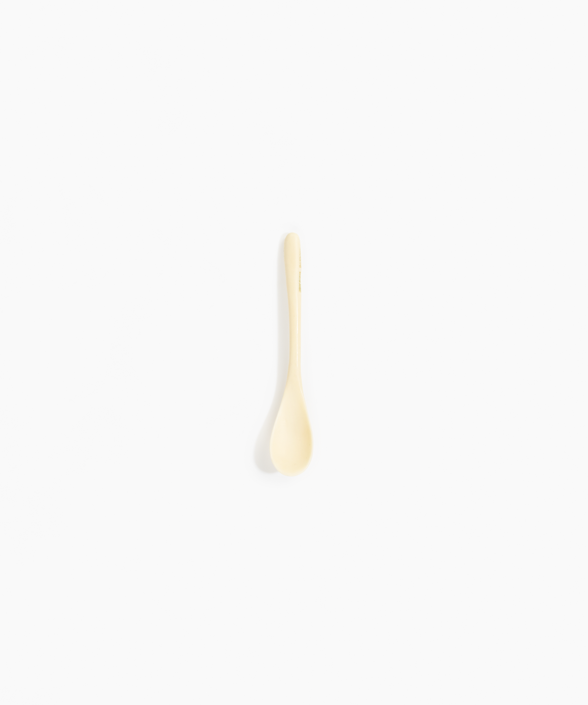 Dinosaur Designs Shell Spoon in Cream color resin