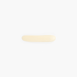 Dinosaur Designs Stone Butter Knife in Cream color resin