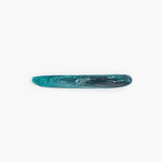 Dinosaur Designs Stone Cheese Knife in Lagoon color resin