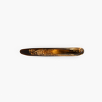 Dinosaur Designs Stone Cheese Knife in Dark Horn color resin