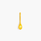 Dinosaur Designs Stone Spoon in Honeycomb color resin
