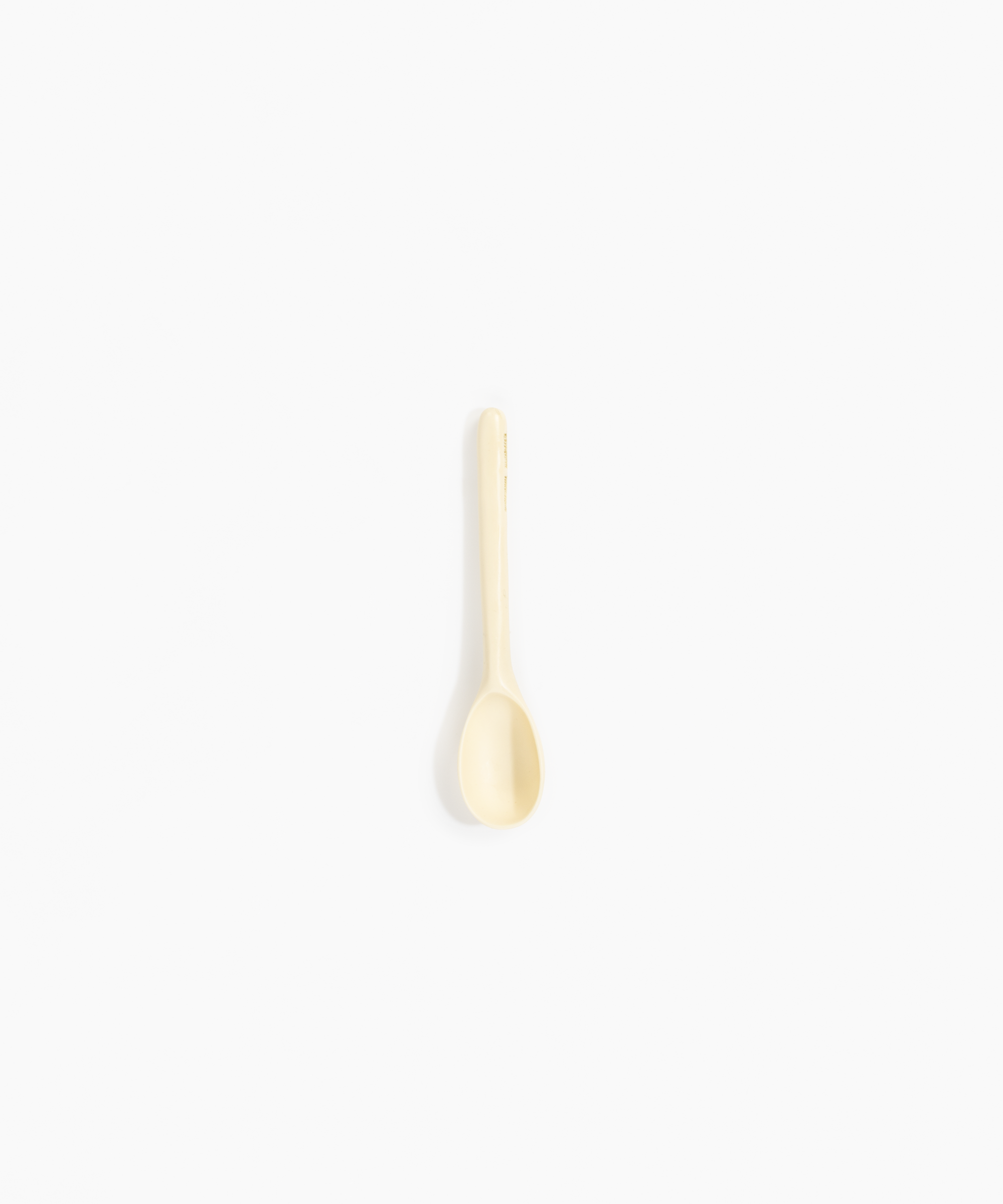 Dinosaur Designs Stone Spoon in Cream color resin