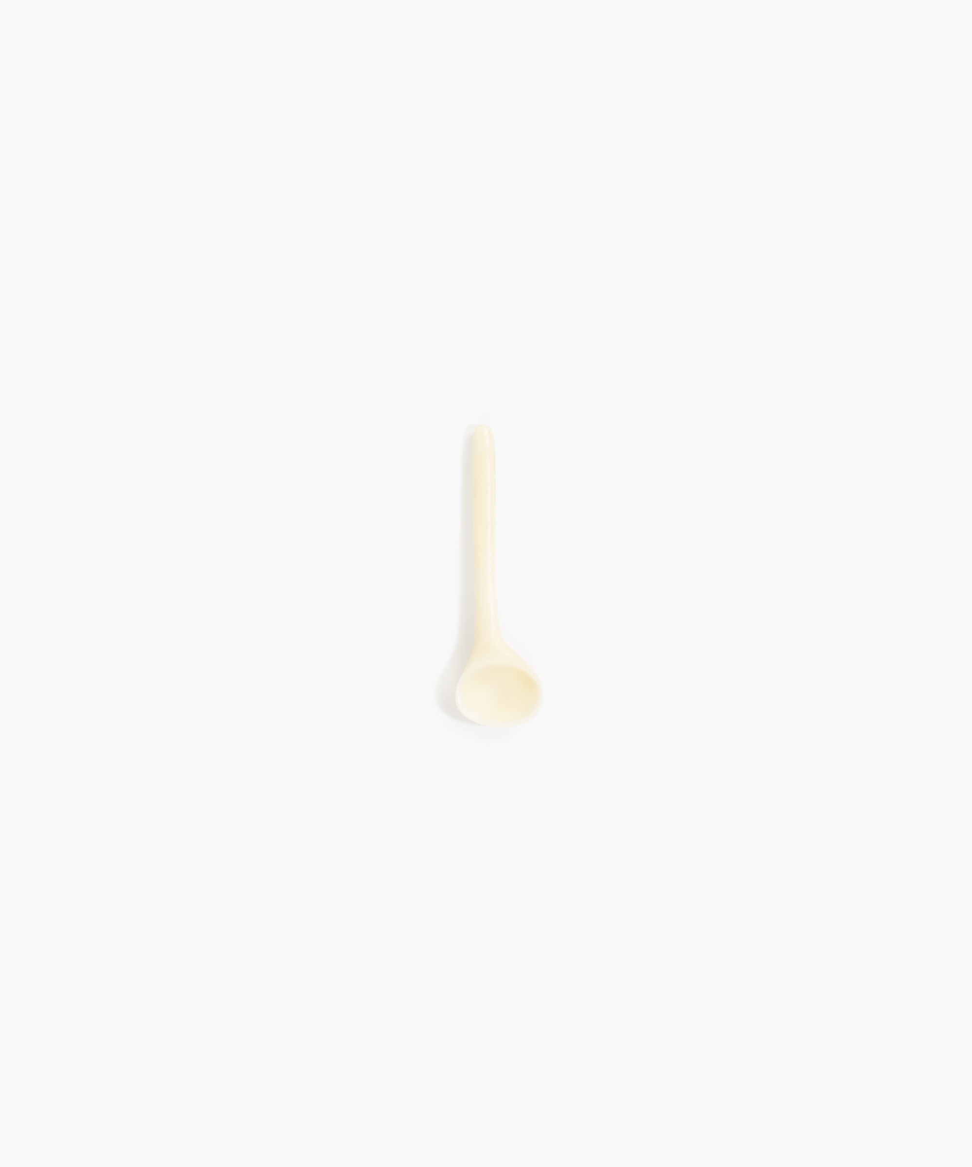 Dinosaur Designs Temple Spoon in Cream color resin
