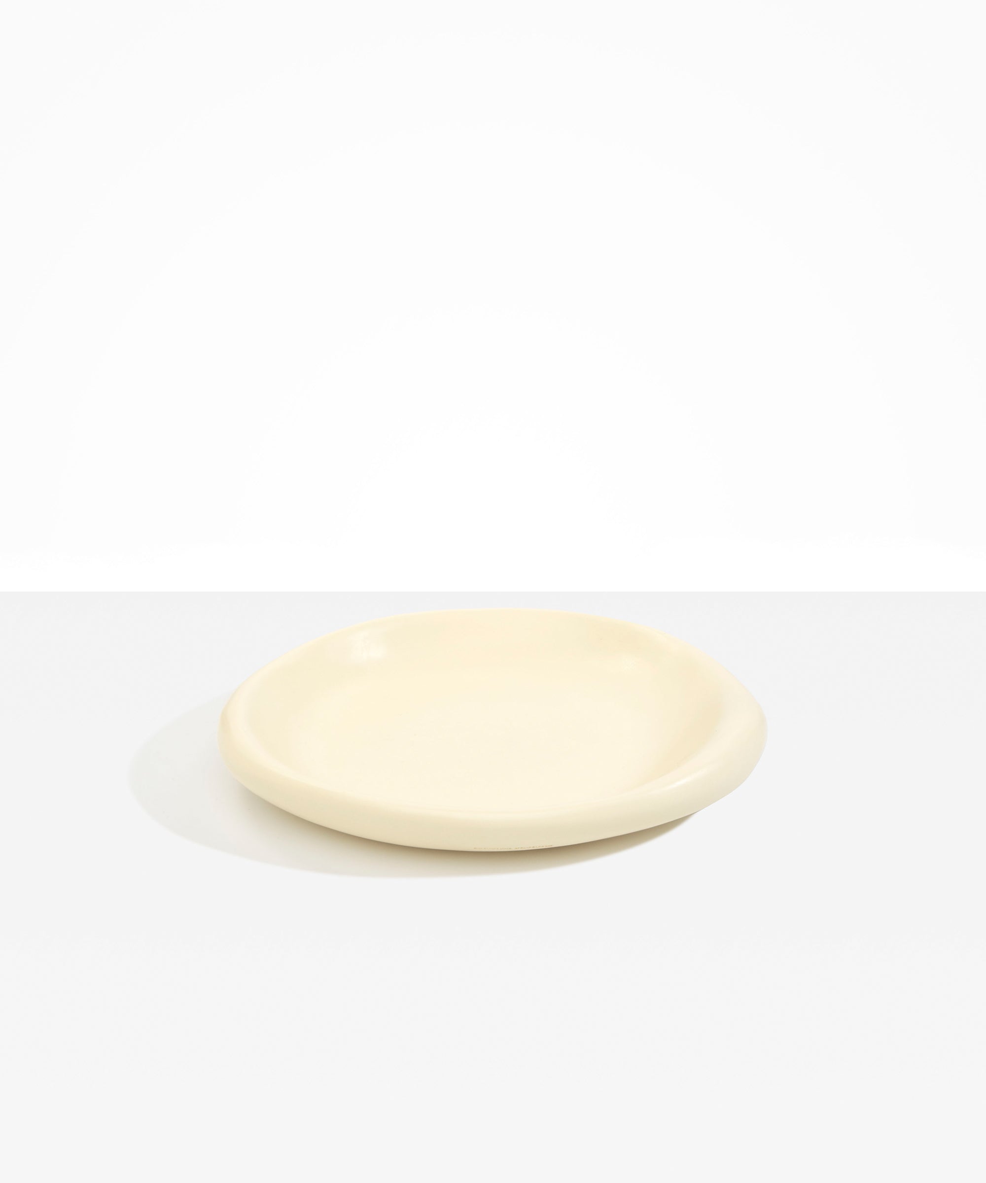 Dinosaur Designs Medium Bones Bowl in Cream color resin