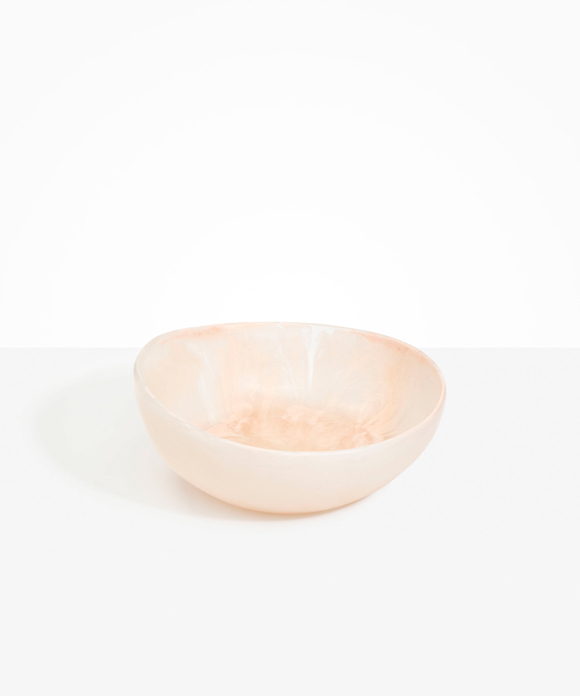 Dinosaur Designs Flow Salad Bowl in Rose Swirl color resin