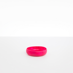 Dinosaur Designs Small Rock Bowl in Flamingo color resin