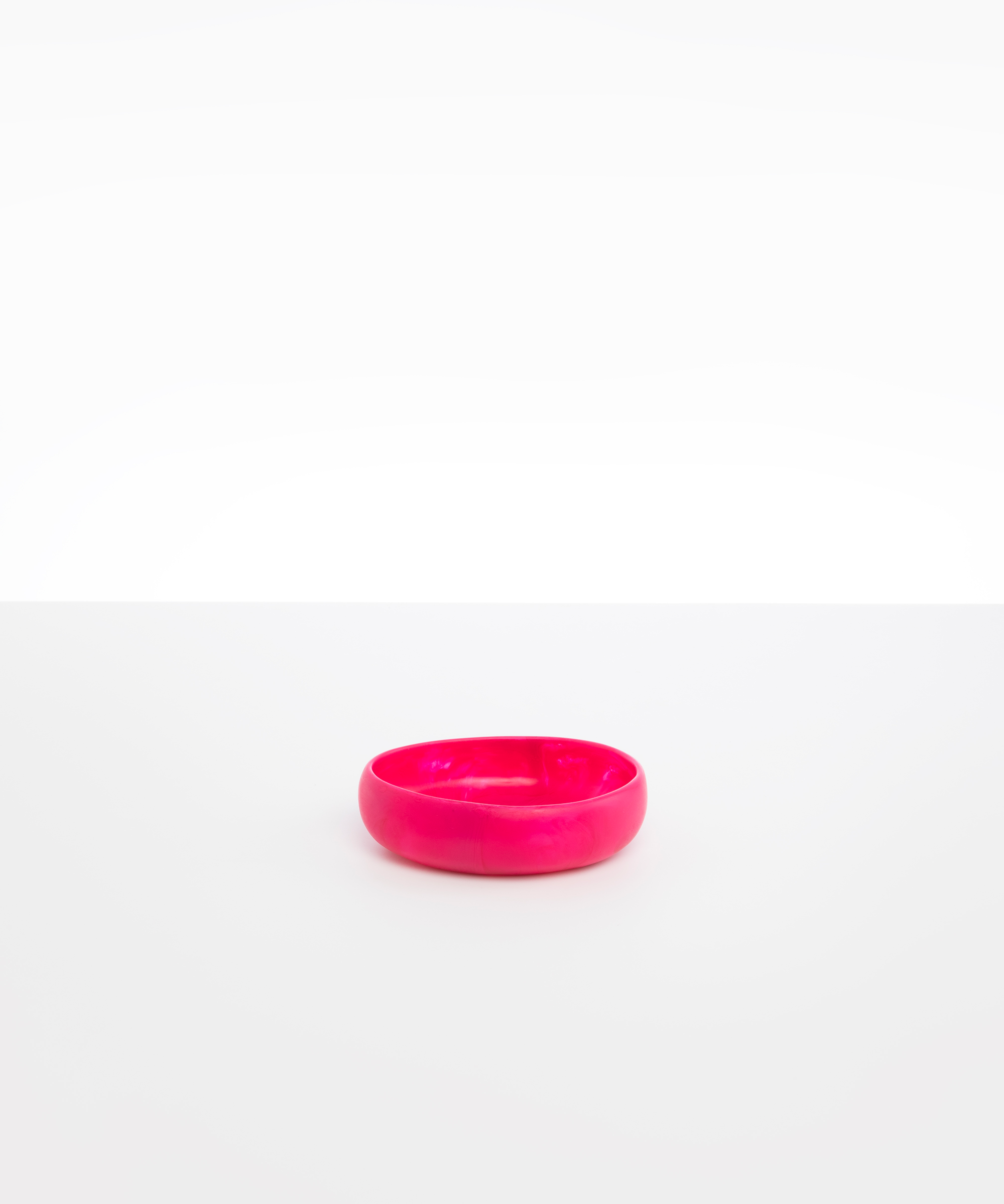 Dinosaur Designs Small Rock Bowl in Flamingo color resin