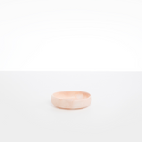 Dinosaur Designs Small Rock Bowl in Rose Swirl color resin