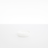 Dinosaur Designs Small Rock Bowl in Snow Swirl color resin