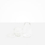 Dinosaur Designs Glass Pebble Carafe in Clear color resin