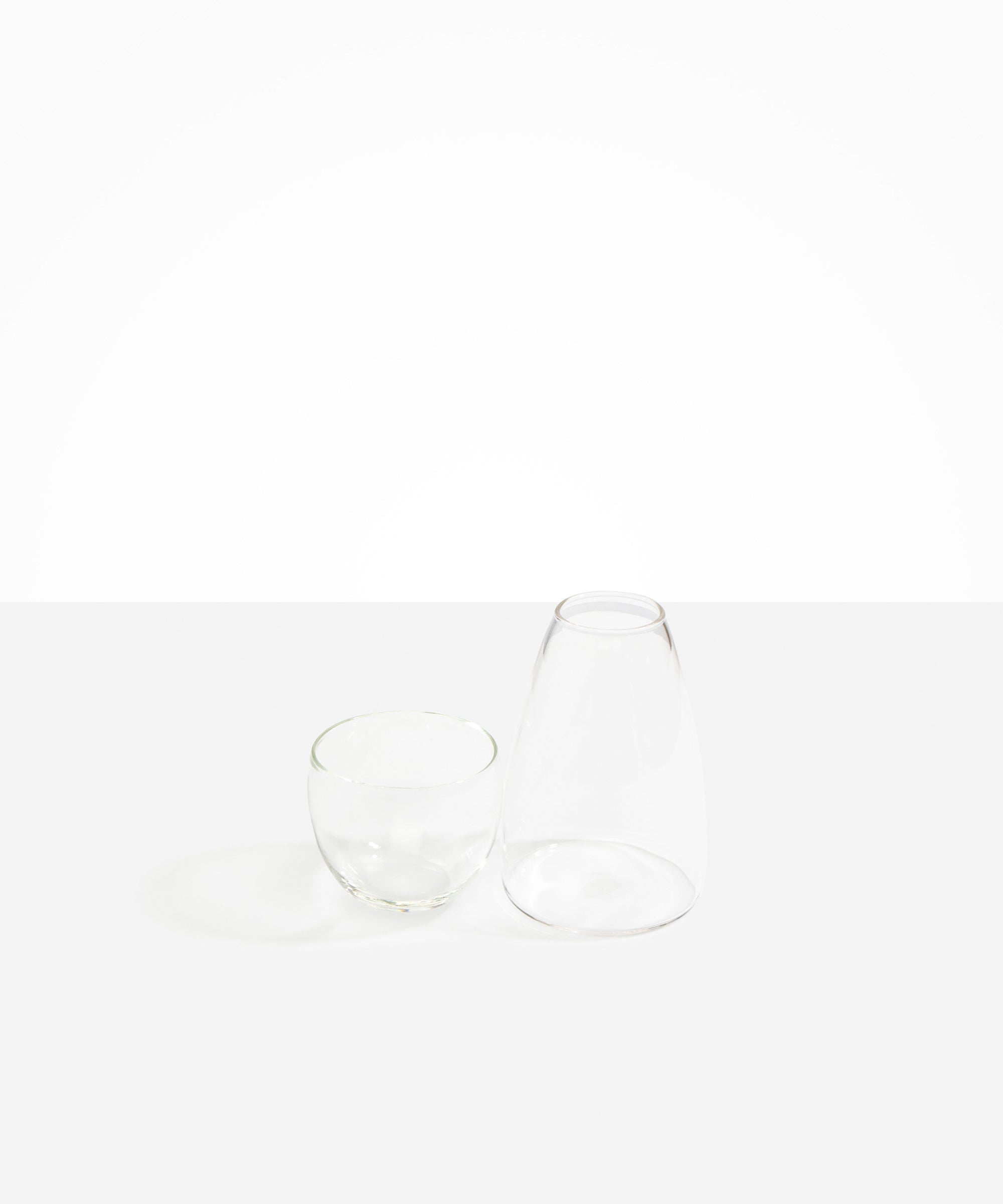 Dinosaur Designs Glass Pebble Carafe in Clear color resin