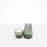 Dinosaur Designs Glass Pebble Carafe in Clear Black color resin