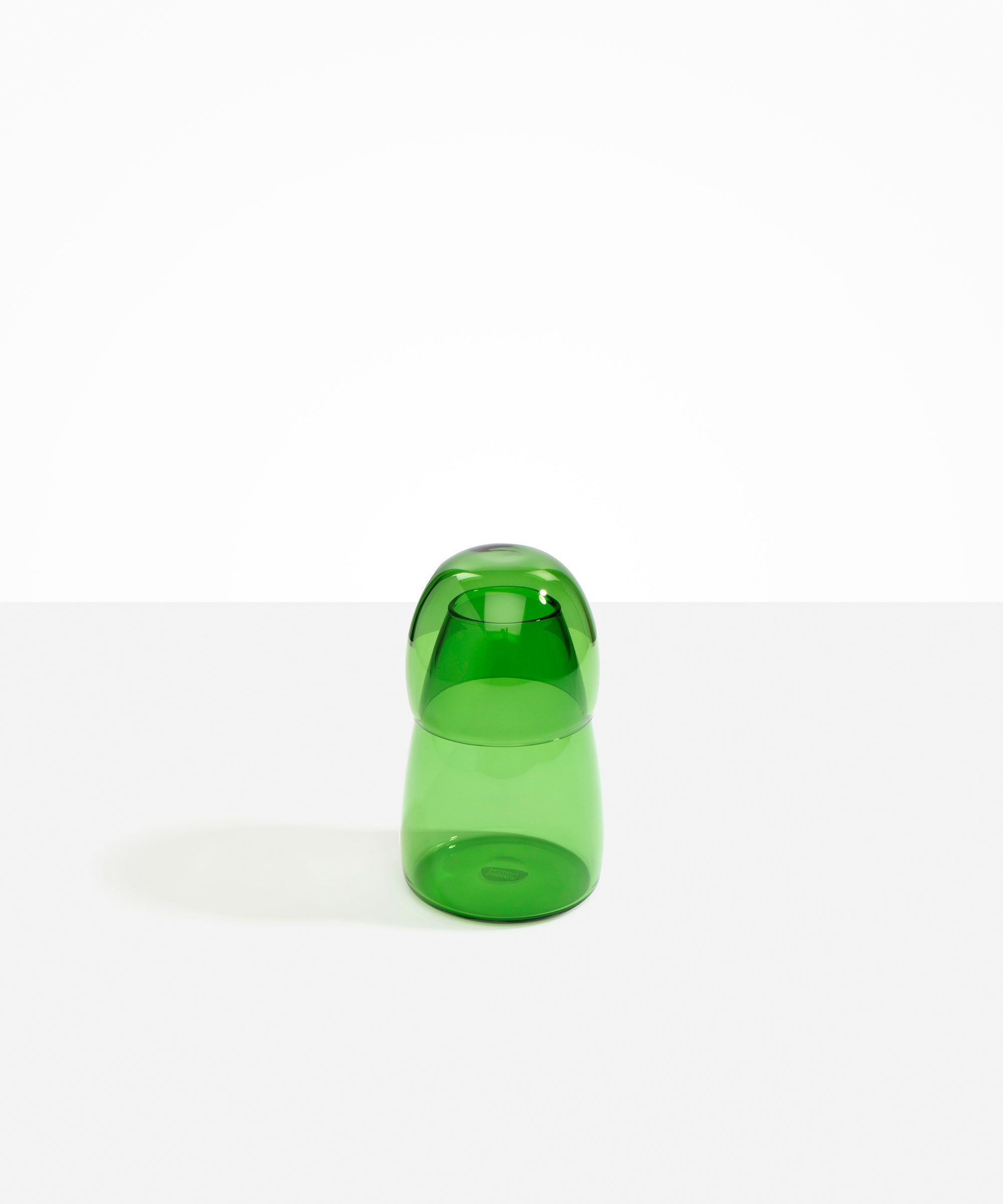 Dinosaur Designs colored Glass Pebble Carafe cup and jug set in transparent green.