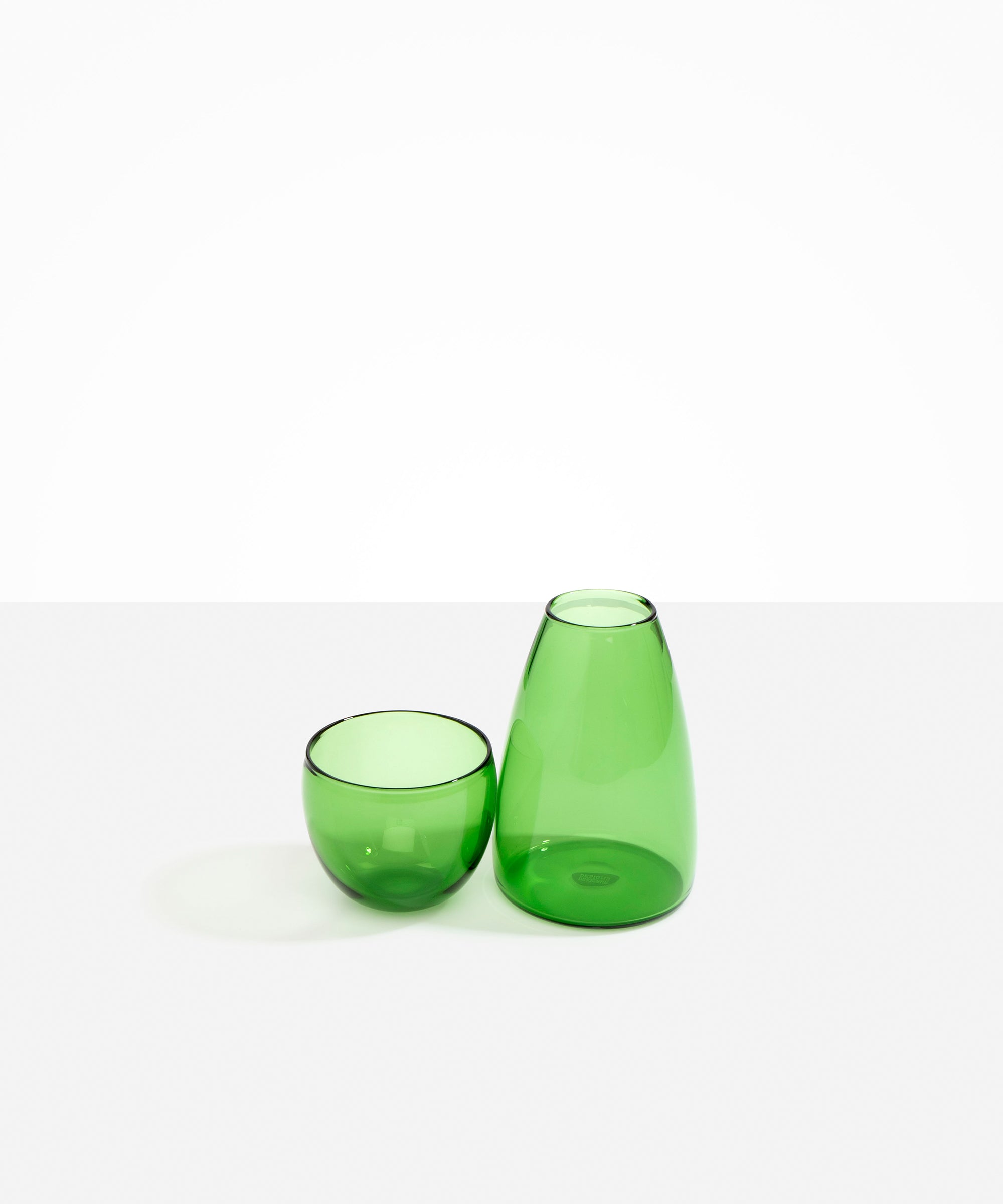 Dinosaur Designs Glass Pebble Carafe in Green color resin