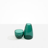 Dinosaur Designs Glass Pebble Carafe in Teal color resin