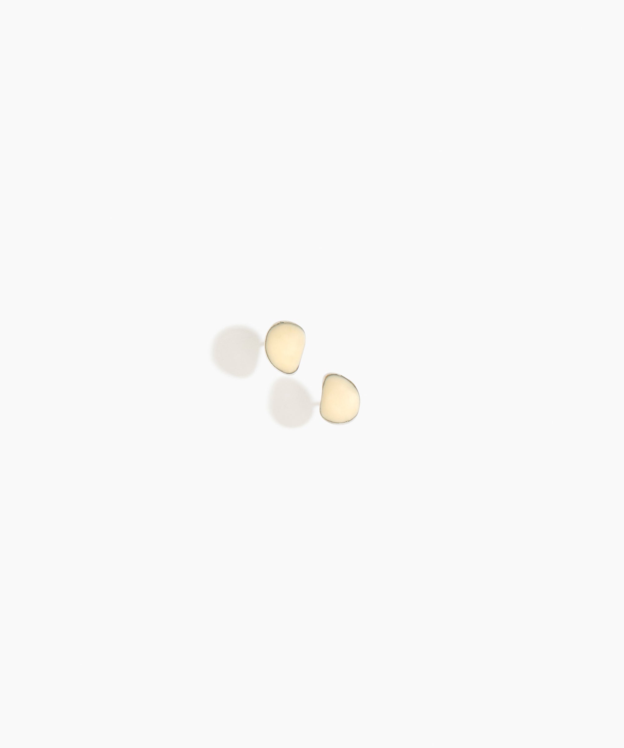 Dinosaur Designs Bones Stud Earrings in Cream color resin with Silver-Plated Brass Material