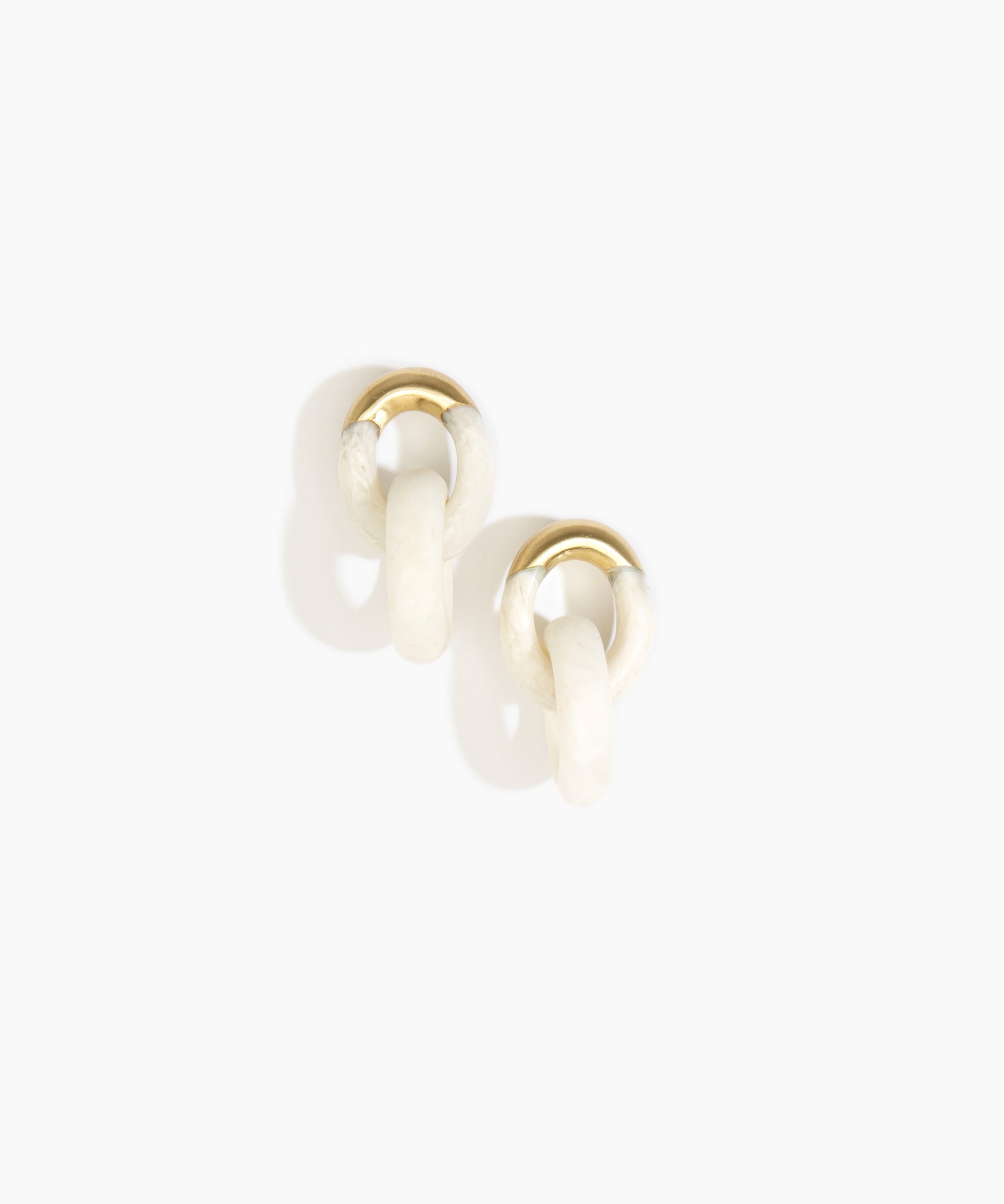 Dinosaur Designs Small Rock Chain Earrings in Snow Swirl color resin with Brushed Nano-Coated Brass Material