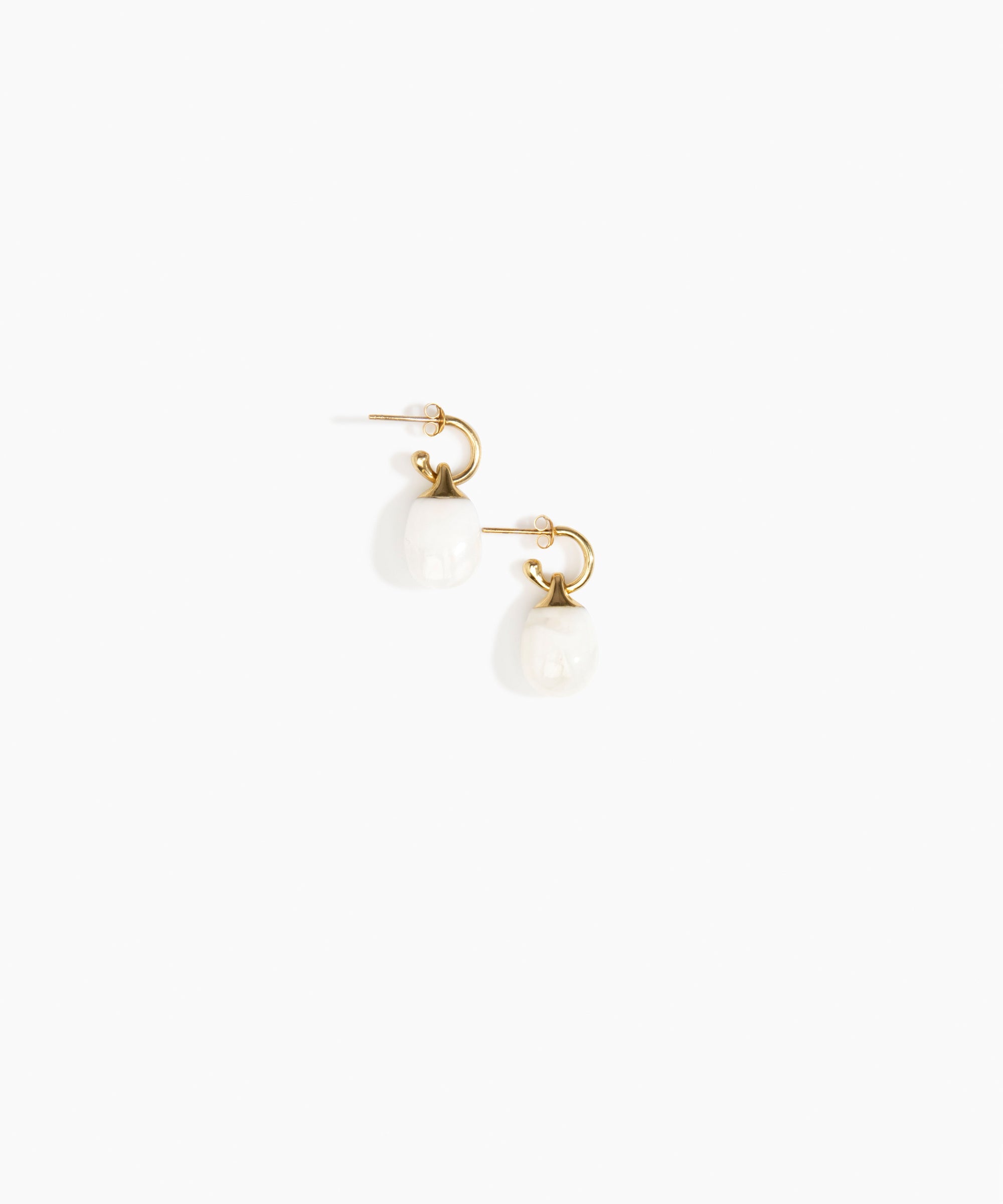 Dinosaur Designs Small River Rock Hoop Earrings in Snow Swirl color resin with Brass Hoop Material