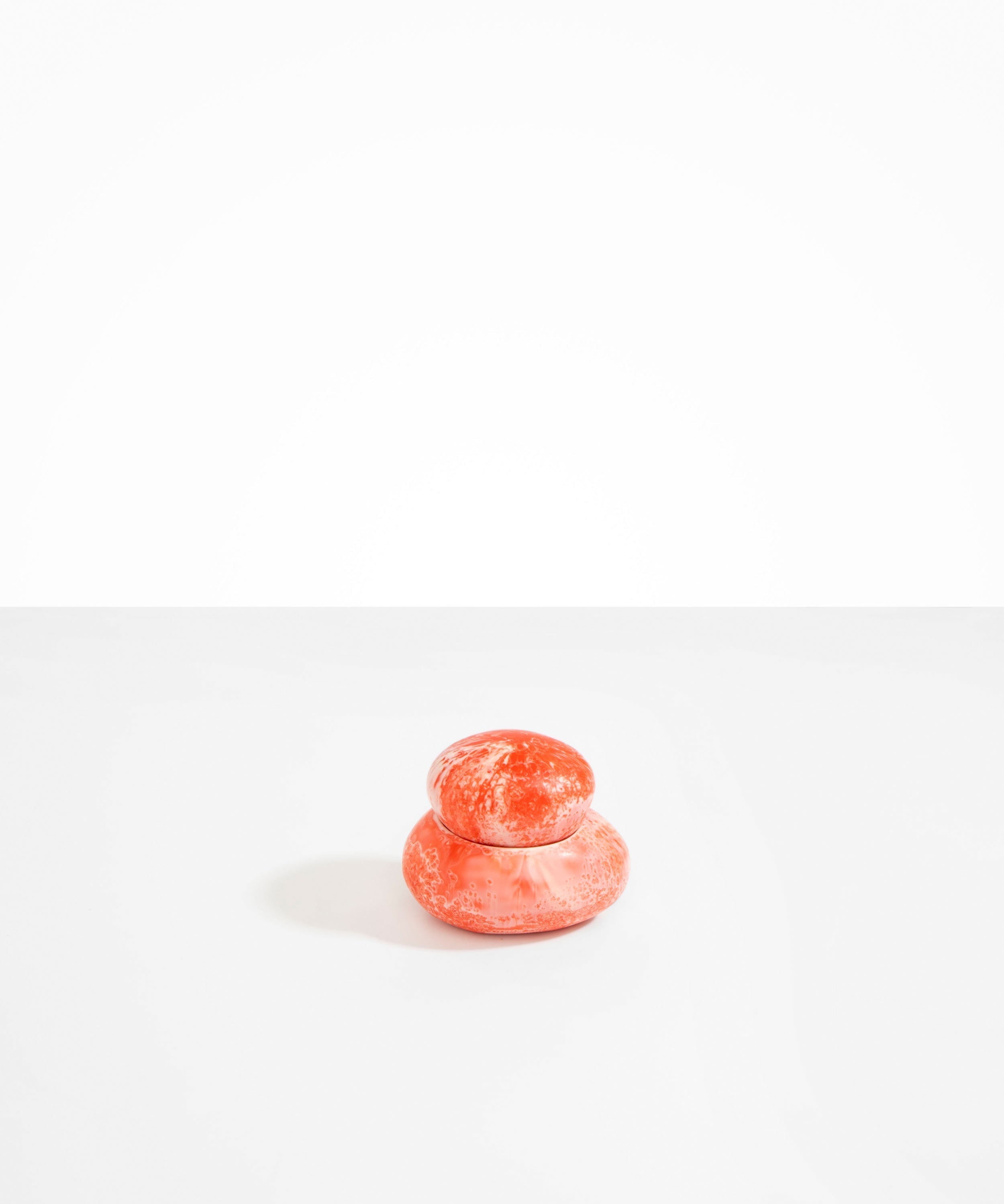 Dinosaur Designs Medium Pebble Jar in Strawberry color resin