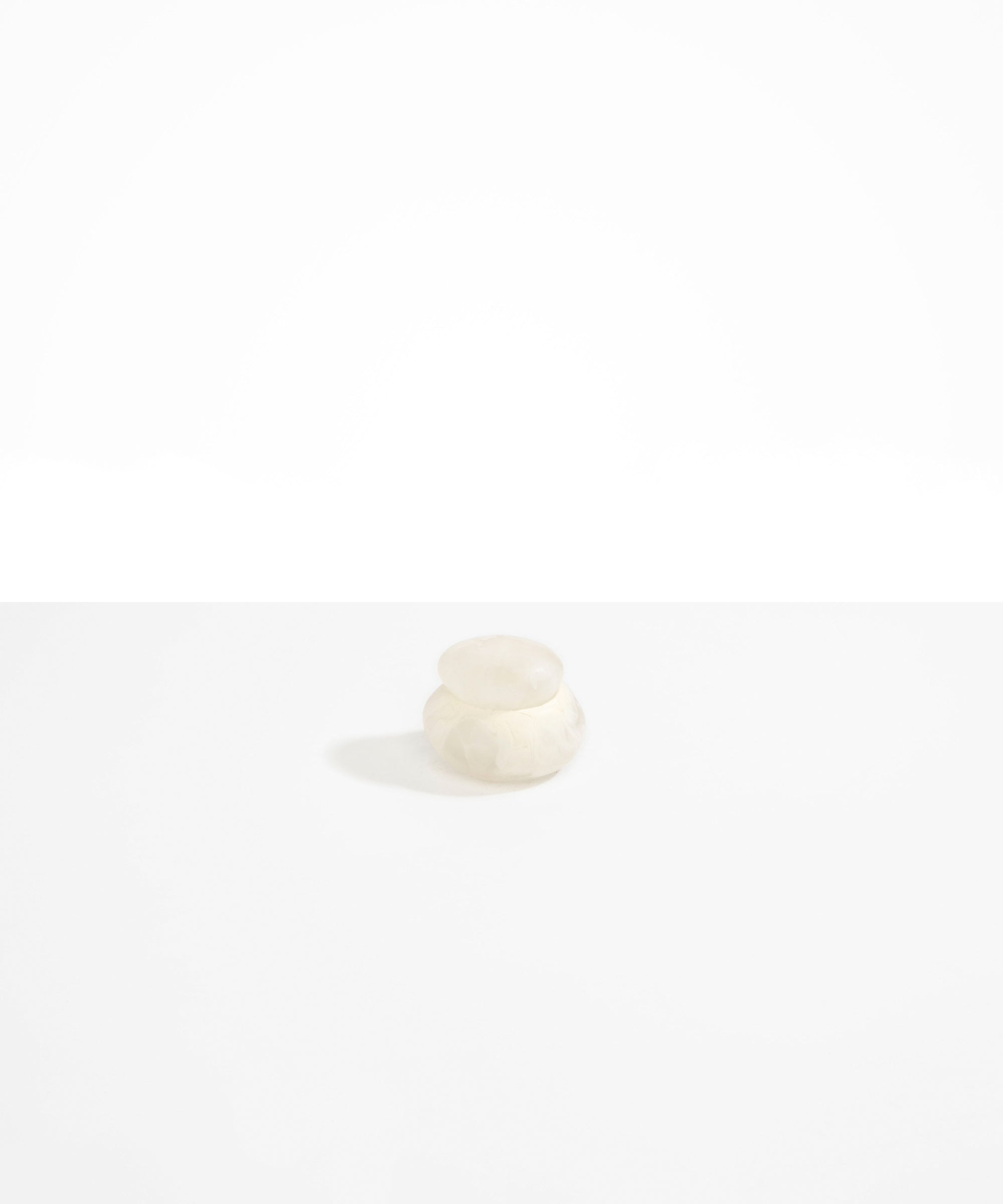 Dinosaur Designs Small Pebble Jar in Chalk Swirl color resin