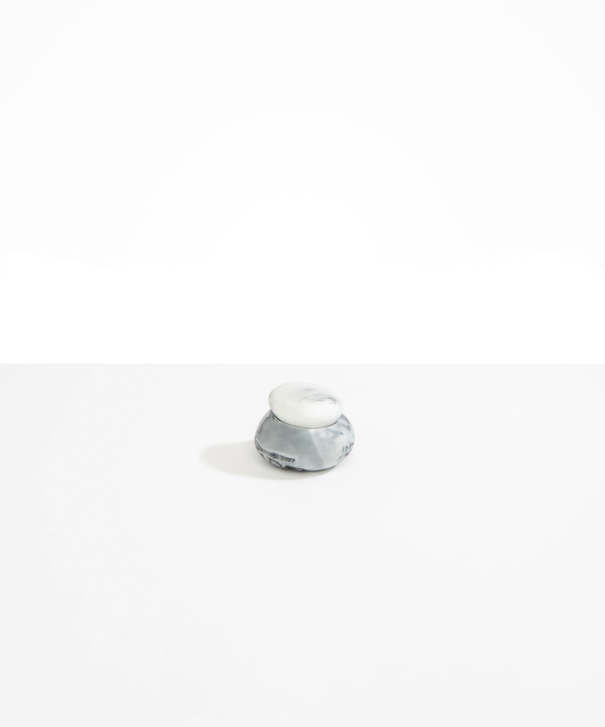 Dinosaur Designs Small Pebble Jar in White Marble color resin