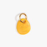 Dinosaur Designs Earth Keyring in Honeycomb color resin with Brass Metal