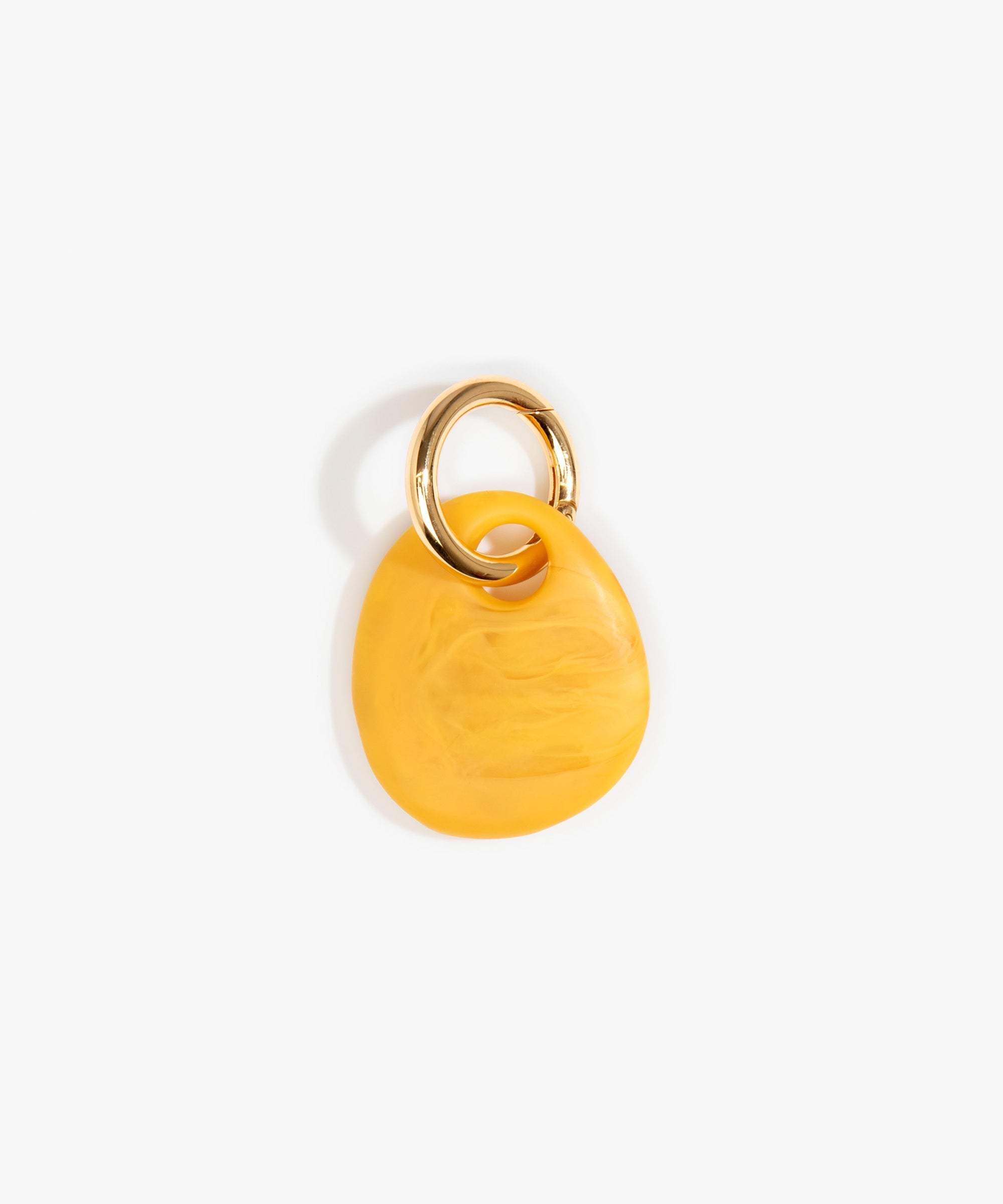 Dinosaur Designs Earth Keyring in Honeycomb color resin with Brass Metal