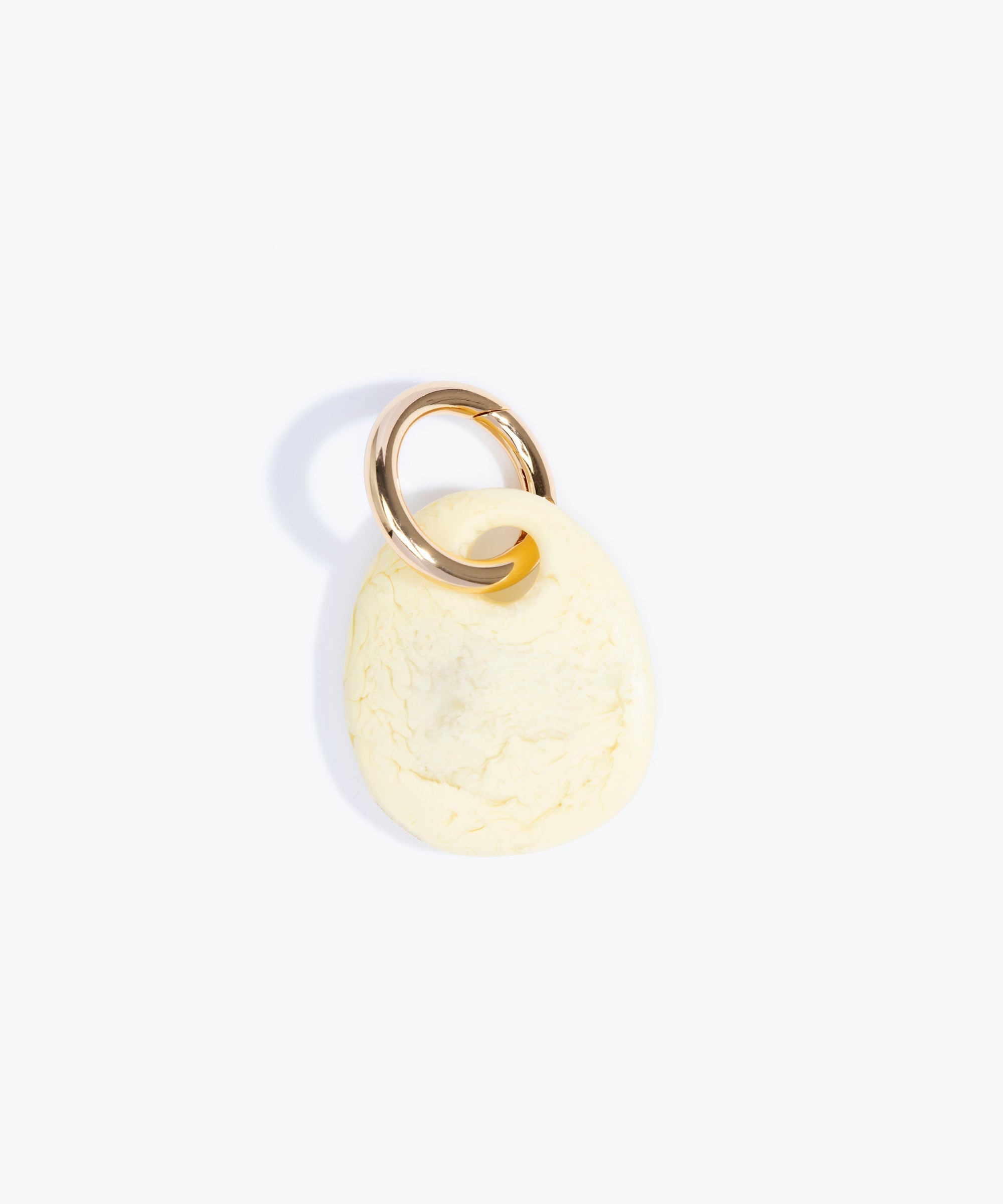Dinosaur Designs Earth Keyring in Lemon color resin with Brass Metal