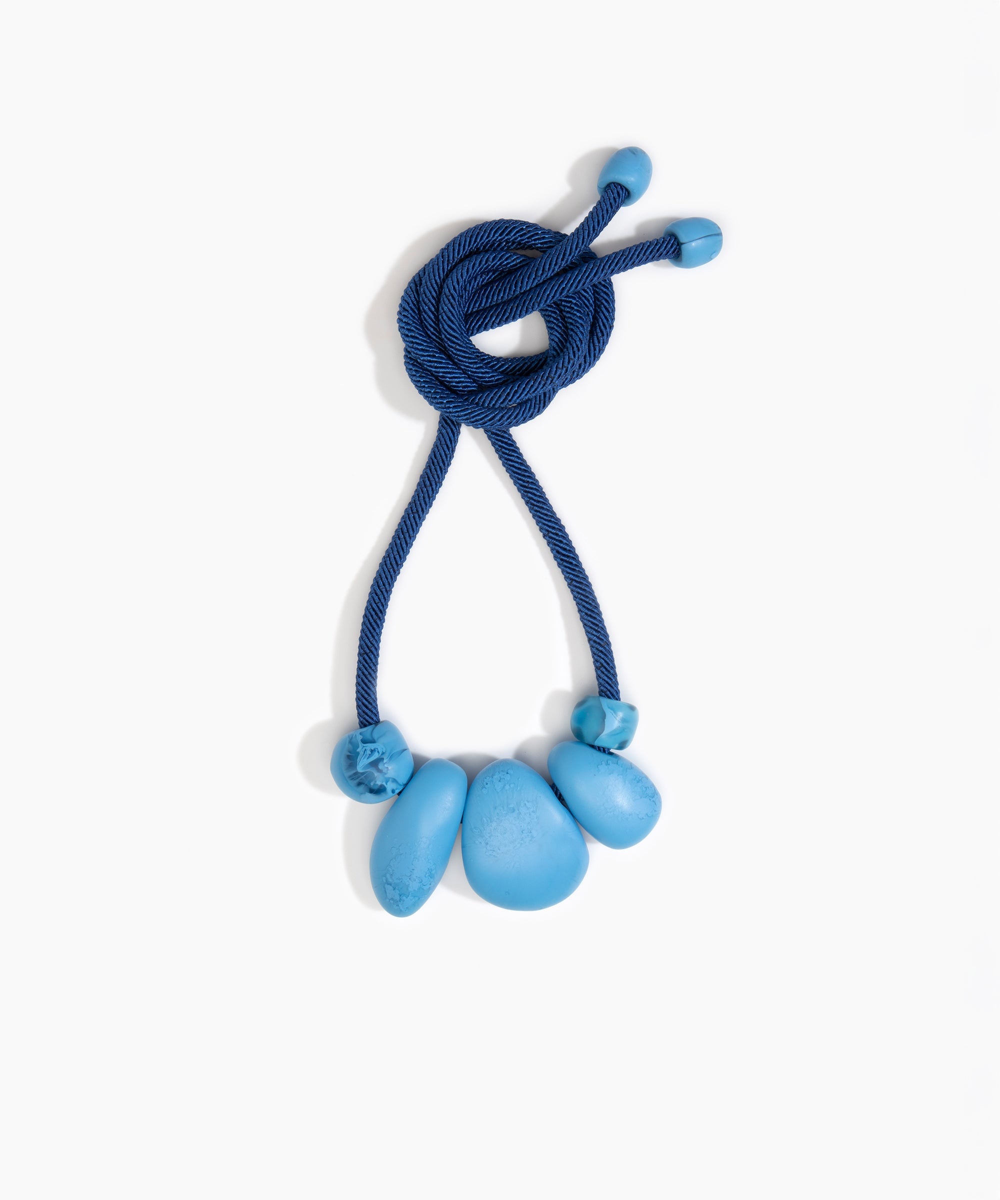 Dinosaur Designs Boulder Rock Necklace in Sky color resin