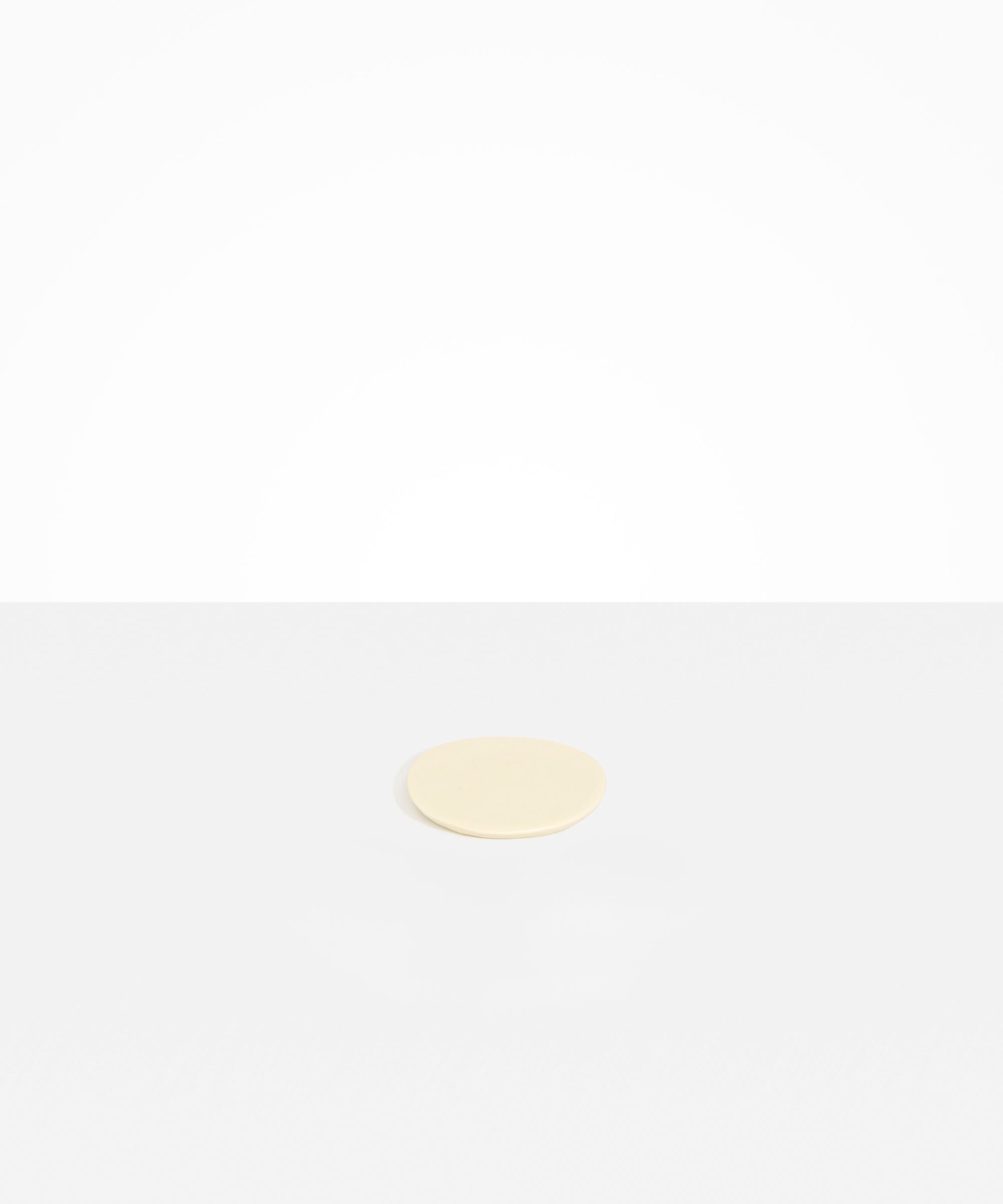 Dinosaur Designs Boulder Coaster in Cream color resin