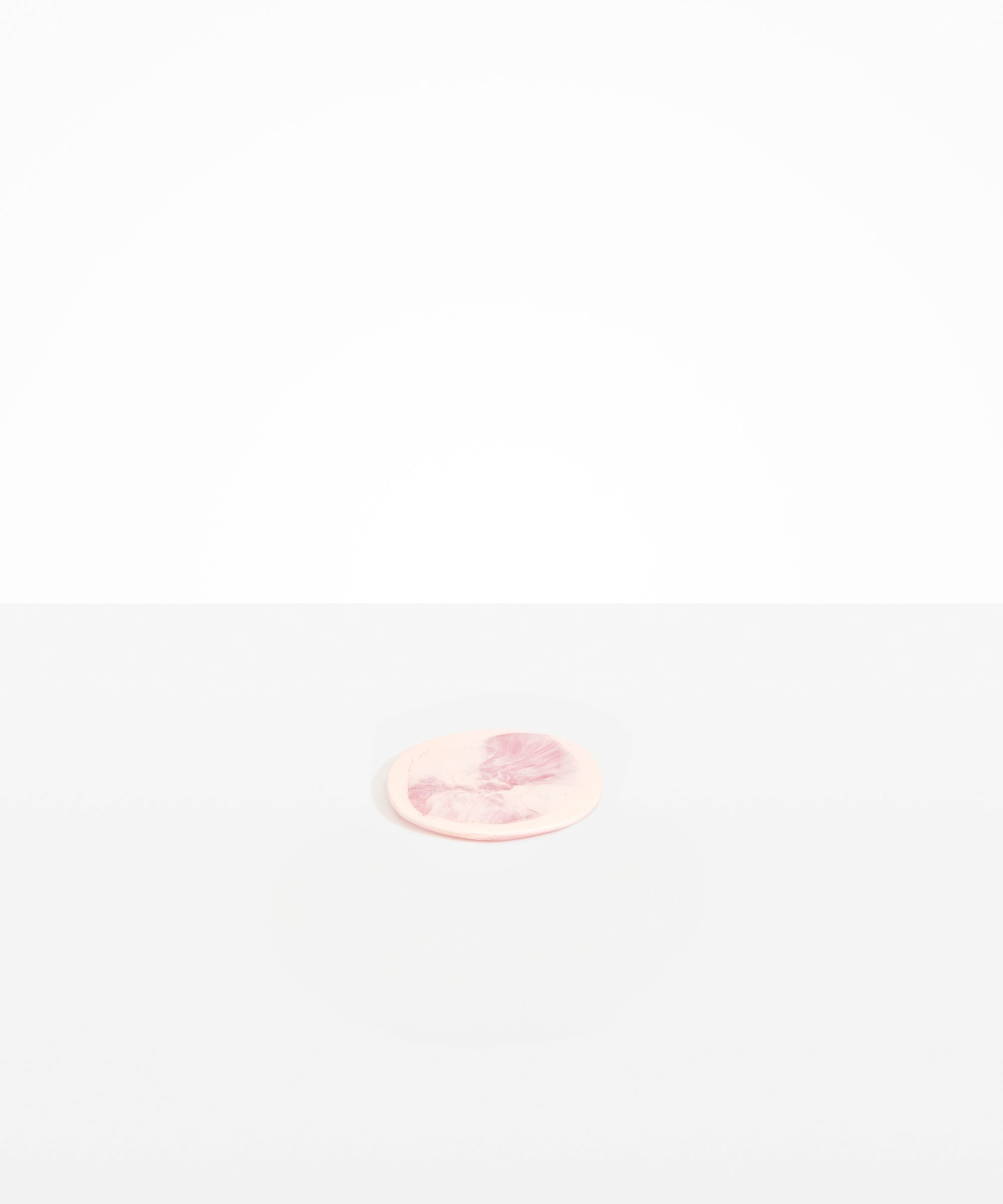 Dinosaur Designs Boulder Coaster in Shell Pink color resin