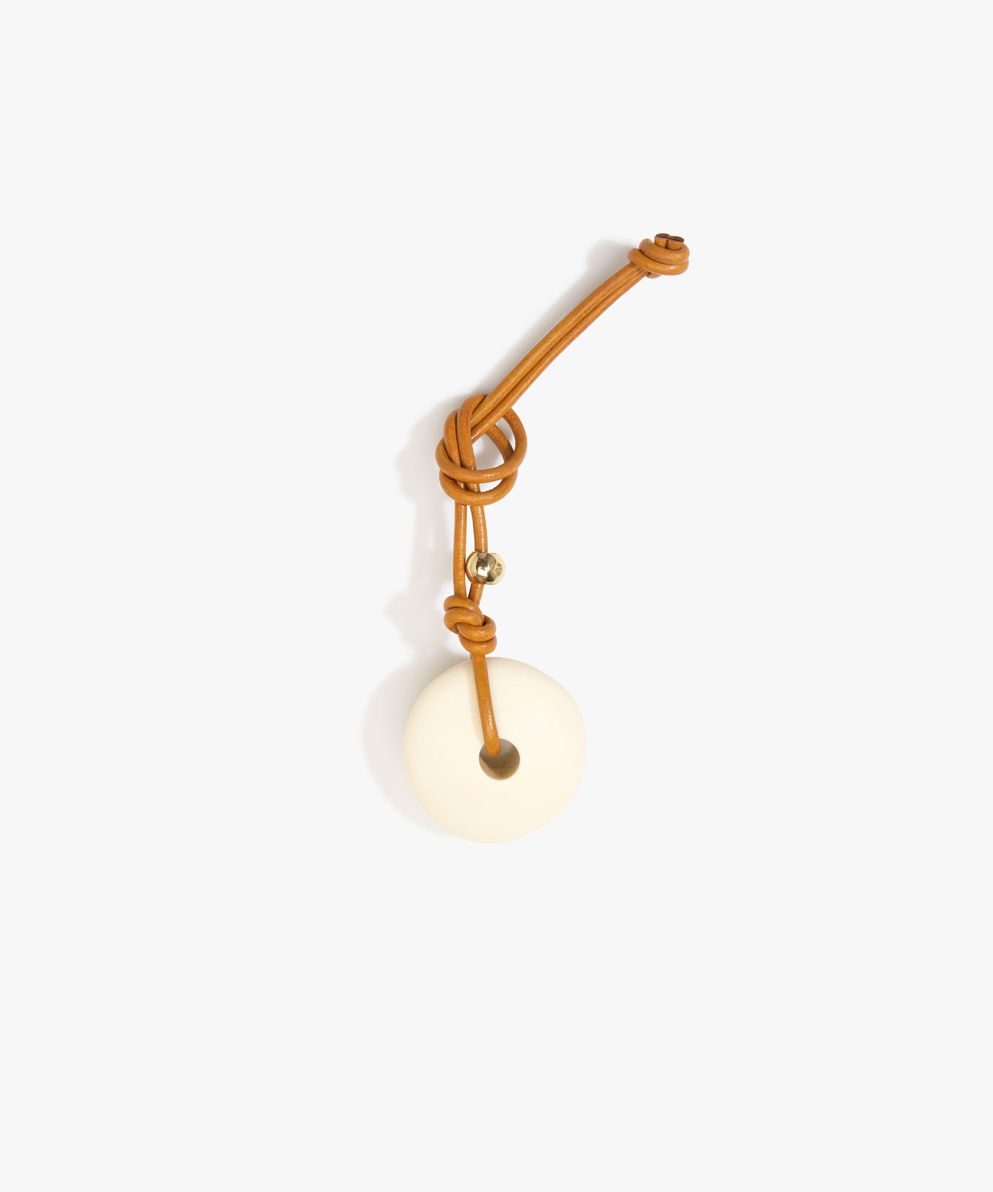 Dinosaur Designs Flat Watercolor Bag Charm in Cream color resin with Brass Material
