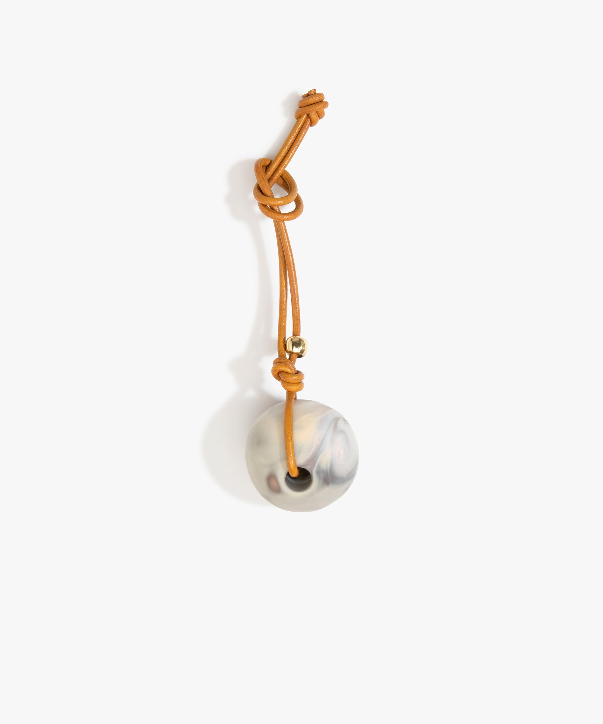 Dinosaur Designs Round Watercolor Bag Charm in Sandy Pearl color resin with Brass Material