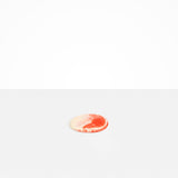 Dinosaur Designs Temple Coaster in Strawberry color resin