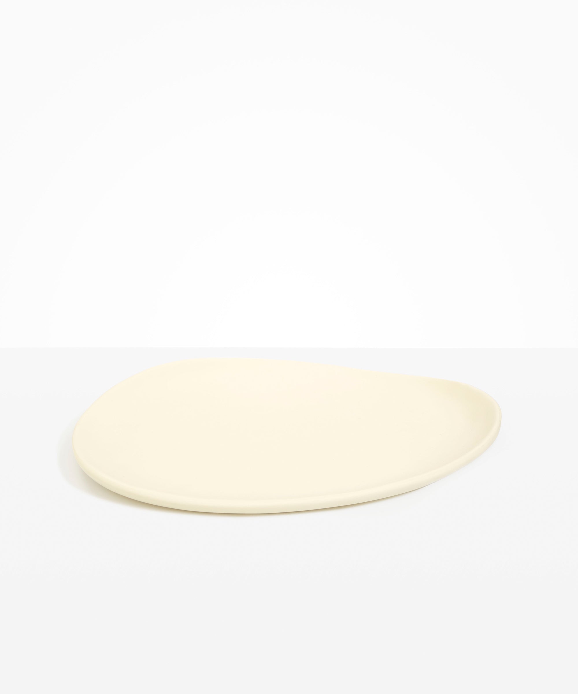 Dinosaur Designs Large Pebble Platter in Cream color resin