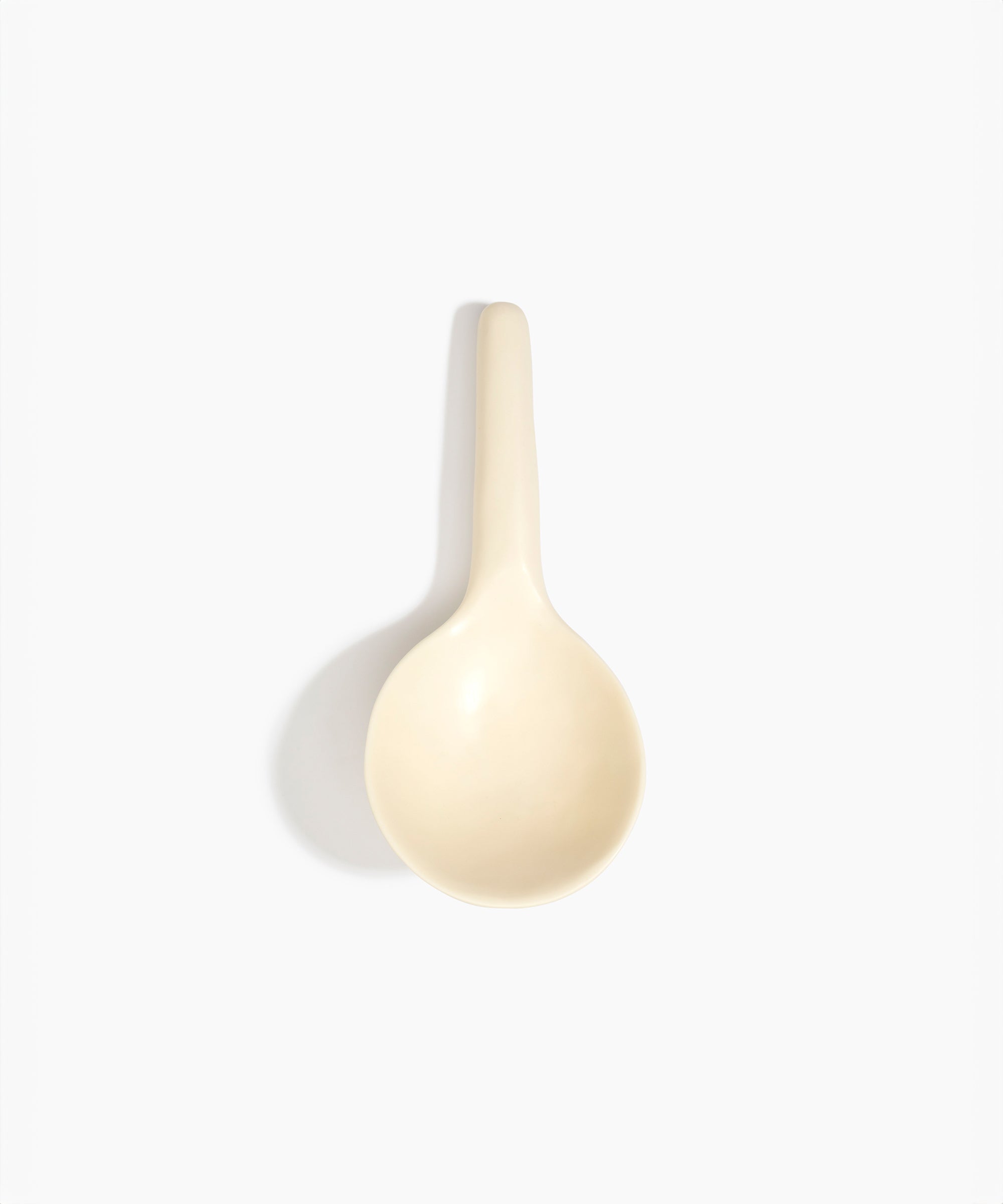 Dinosaur Designs Large Round Spoon in Cream color resin