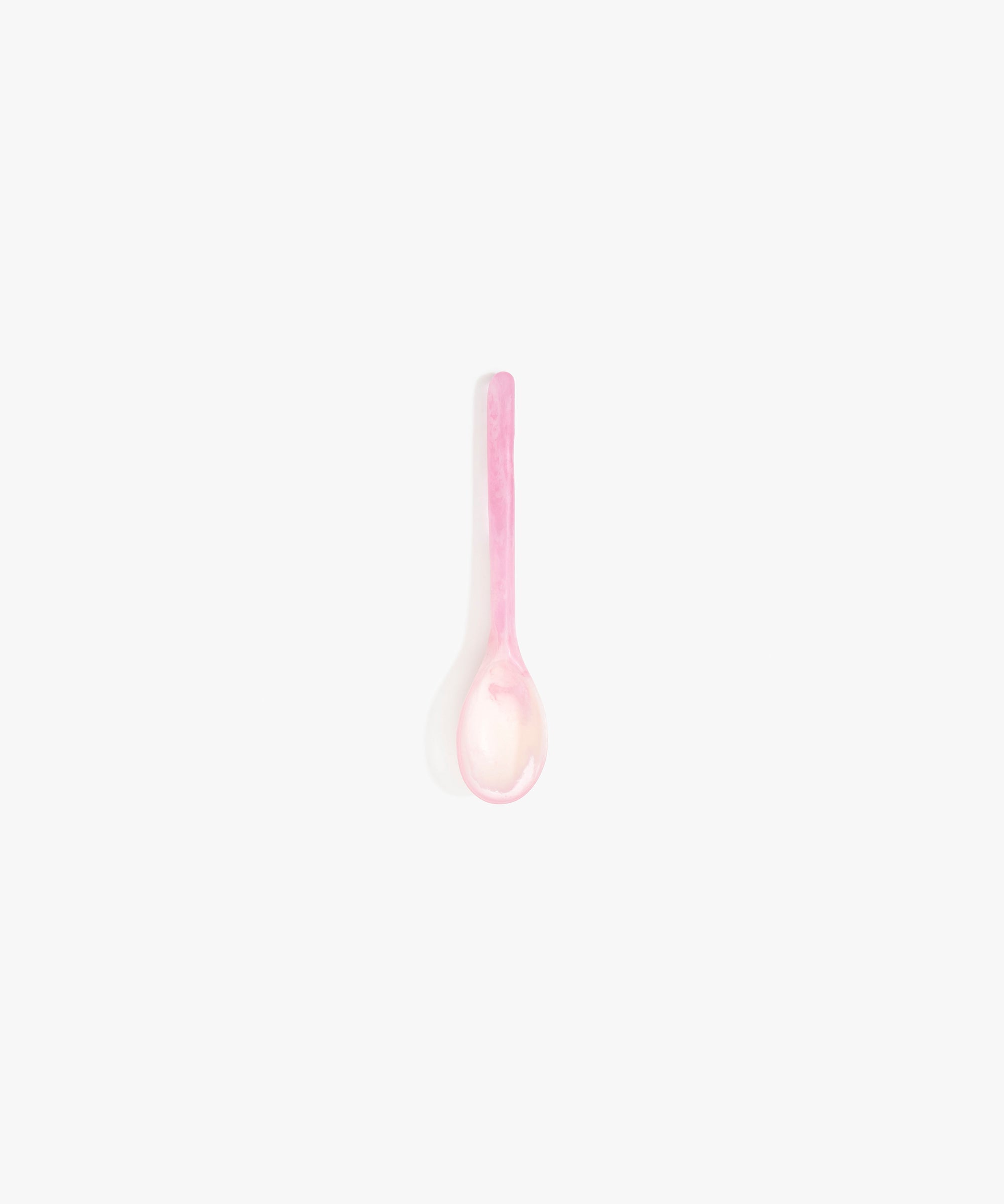 Dinosaur Designs Stone Spoon in Shell Pink color resin